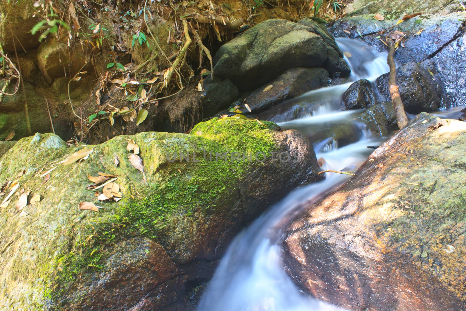 Nature waterfall in deep forest, in national park Thailand