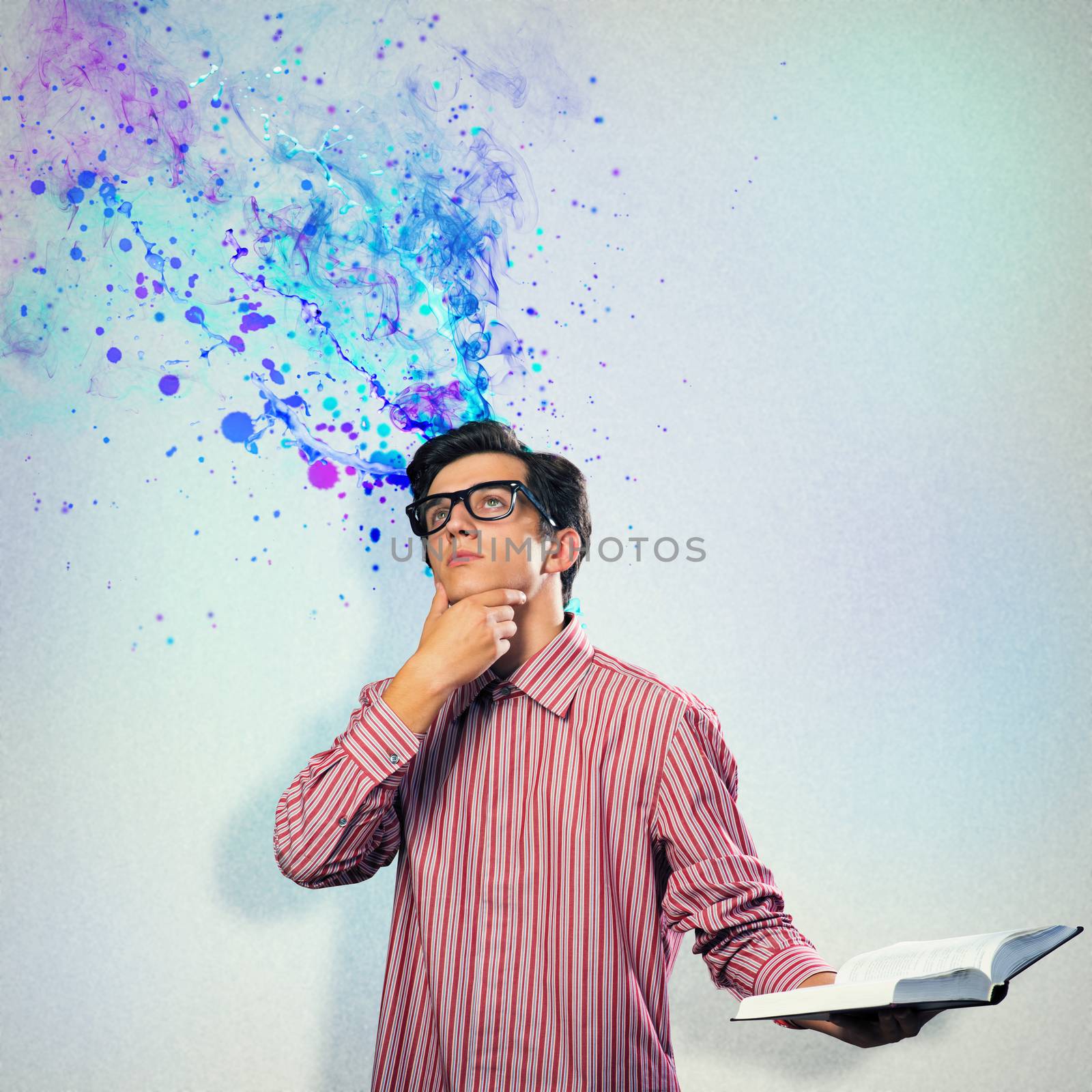 image of a young man with a book, a creative mind