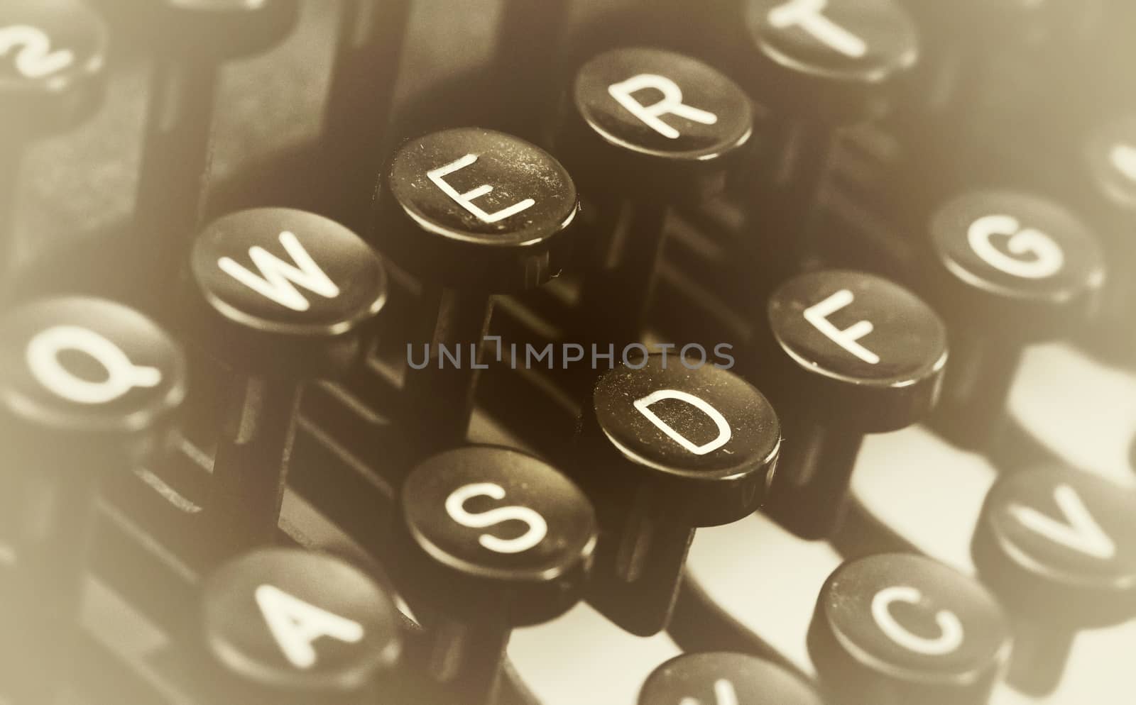 Close up photo of antique typewriter keys, shallow focus