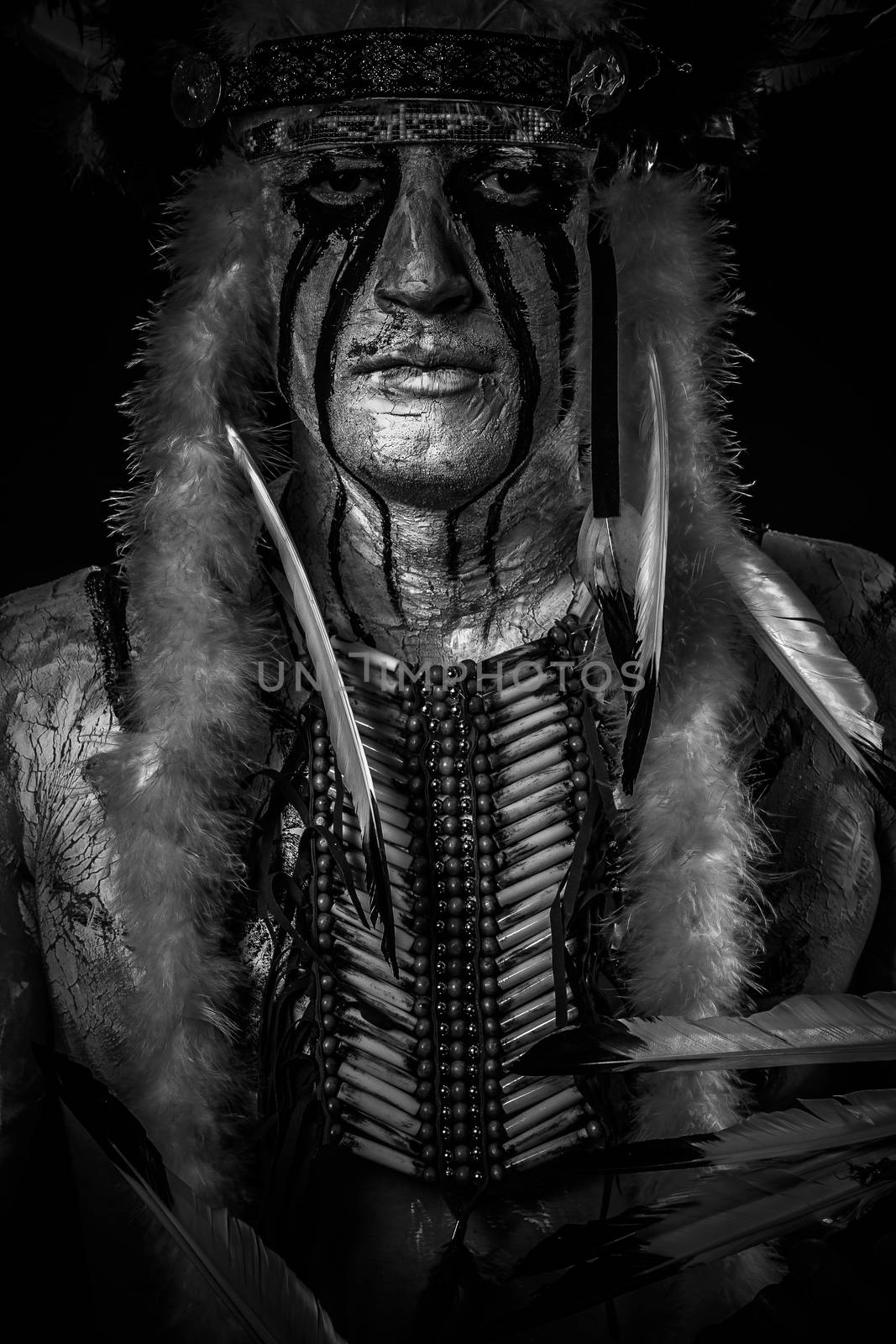 American Indian chief with big feather headdress, warrior