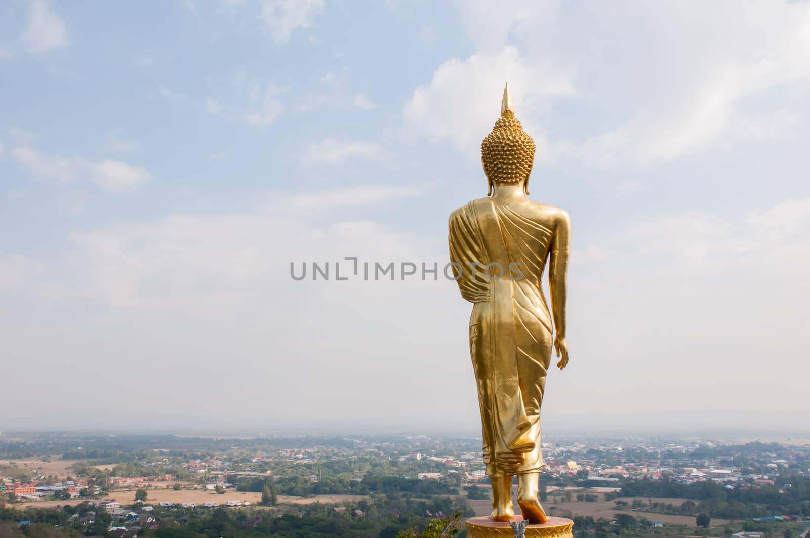 Buddha standing on a mountain Wat Phra That Khao Noi, Nan Province, of Thailand