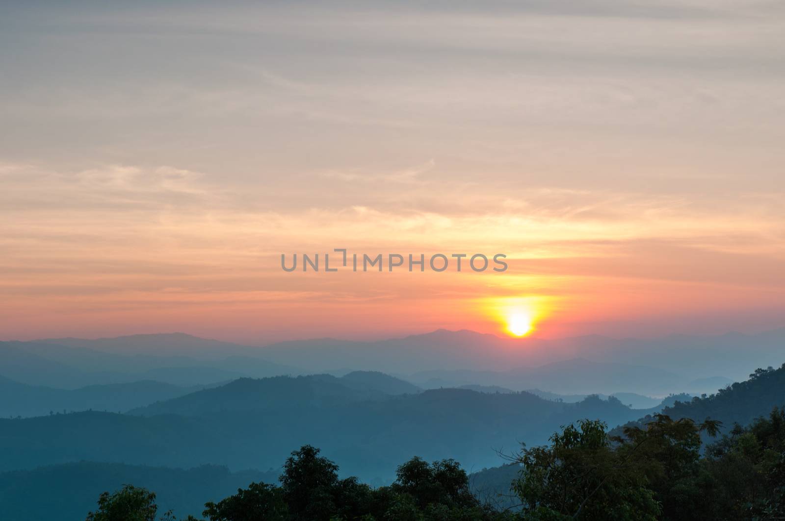 Majestic sunset in the mountains landscape. by Sorapop