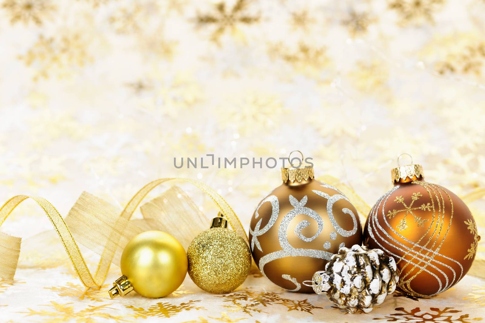 Golden Christmas ornaments background by elenathewise