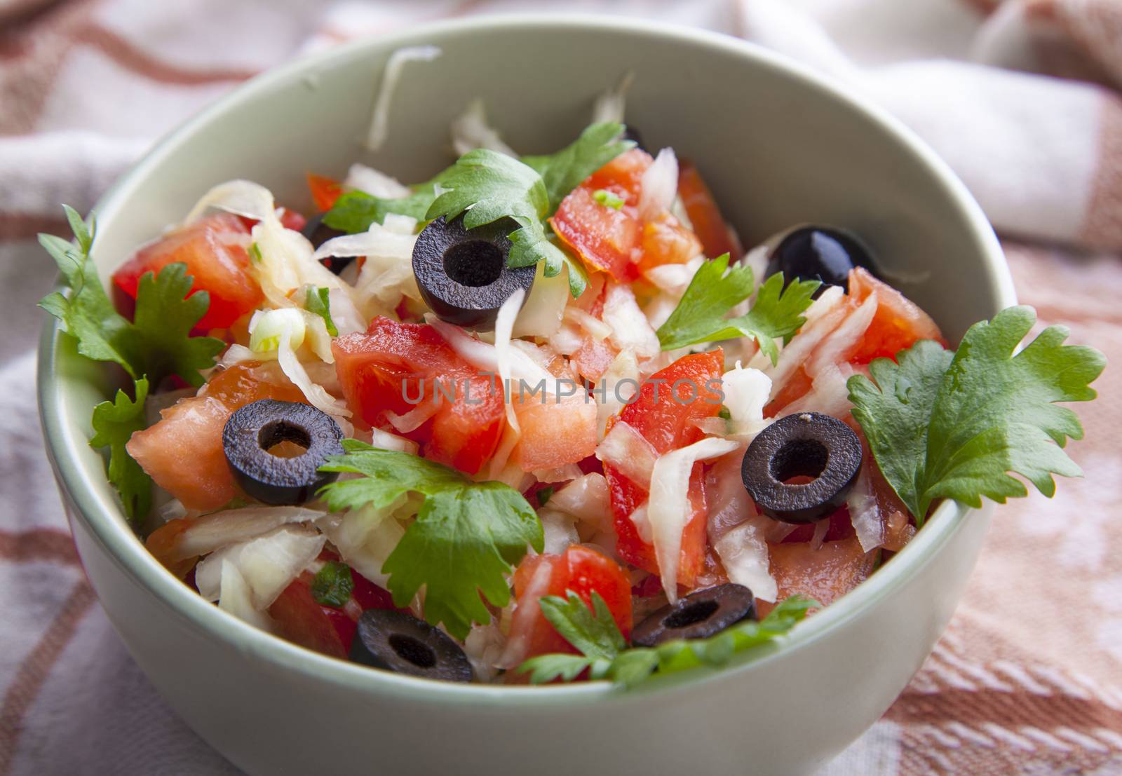 Closeup of salad with olives