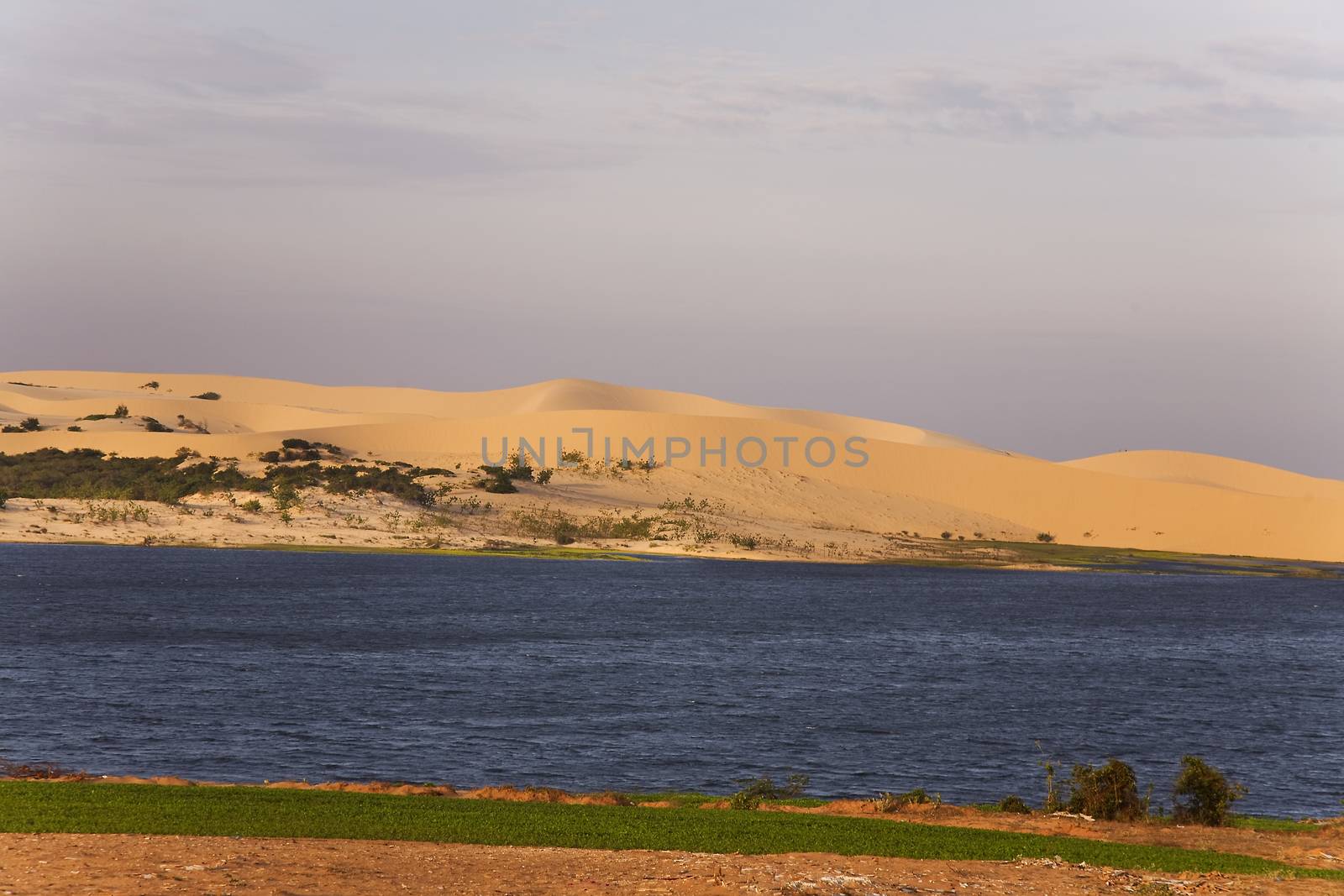 White sand dunes on sunrise, Mui Ne, Vietnam by foryouinf