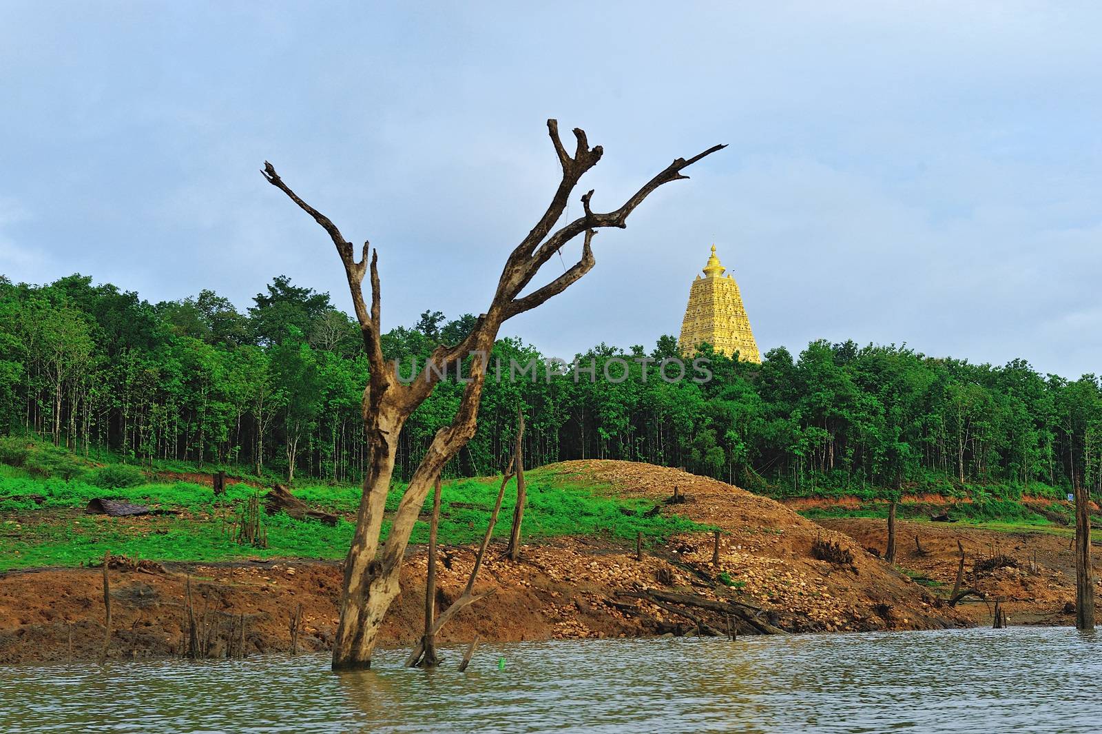 drought land and beautiful pagoda in thailand. Sangkraburi, Kanc by think4photop