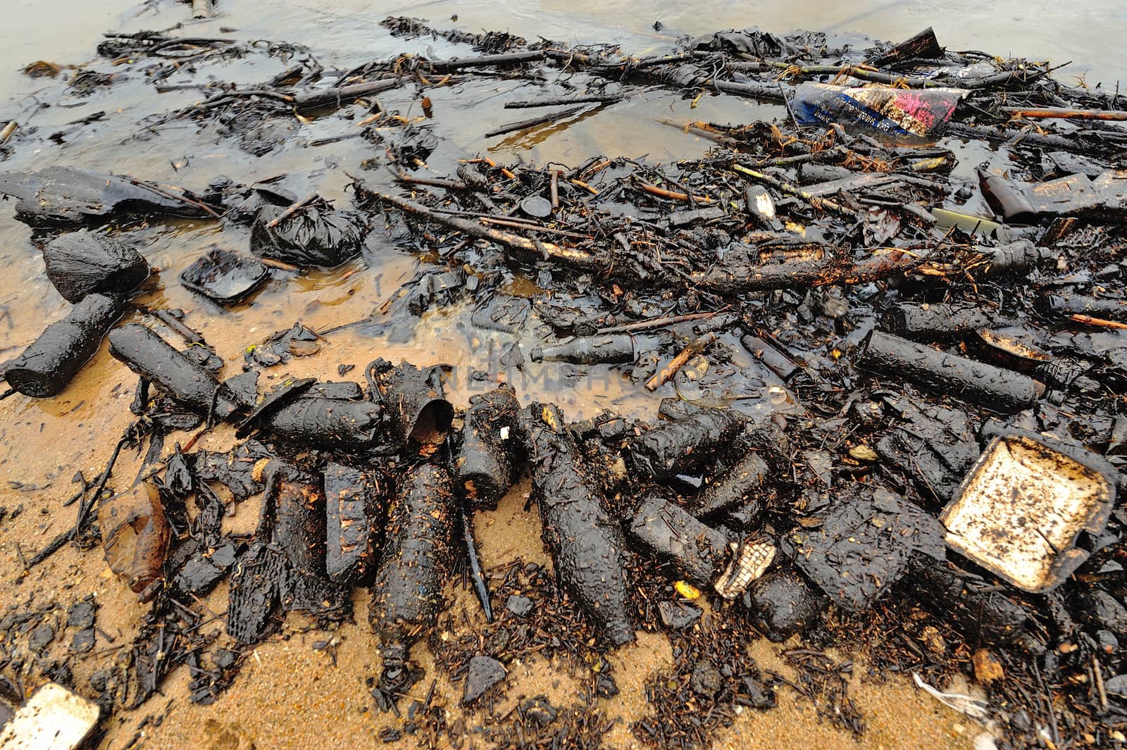 oil polution on the beach, Thailand