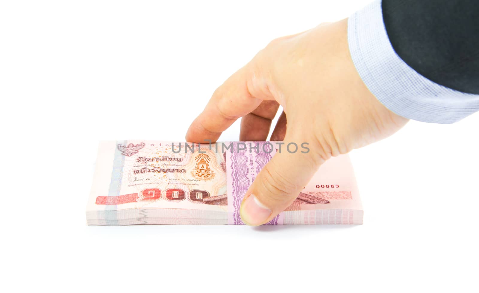 Hand holding a bulk of 100 baht Thailand banknote