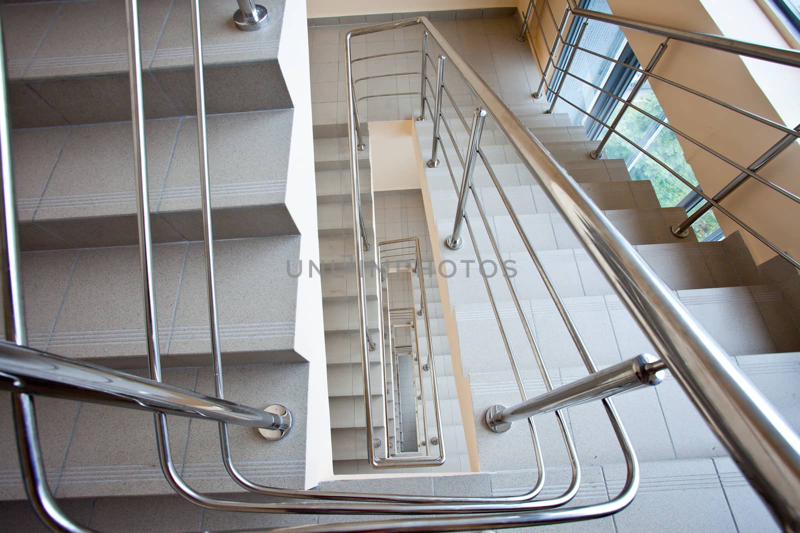 staircase with metal railing in the business center