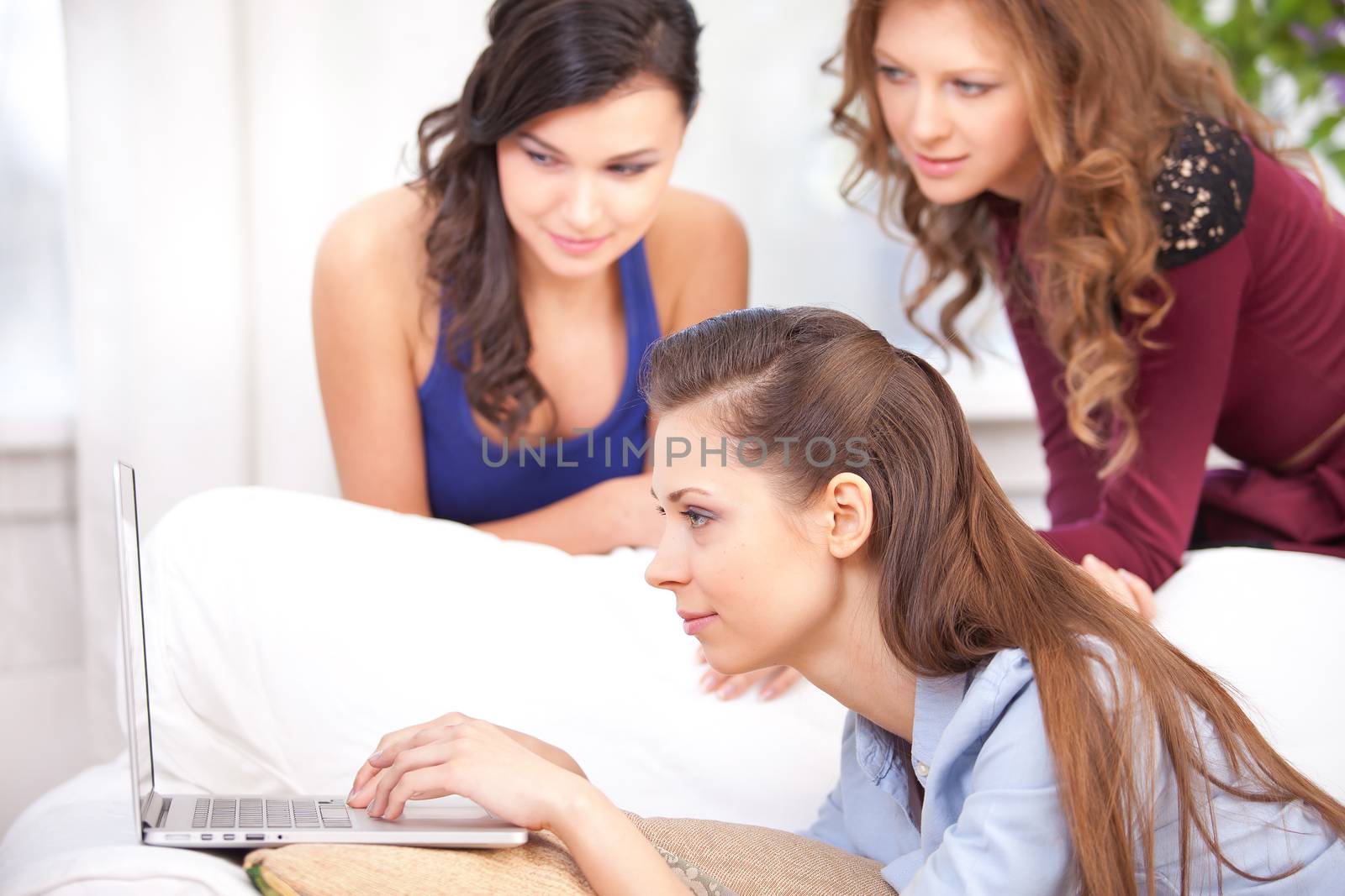 Three girls and a laptop