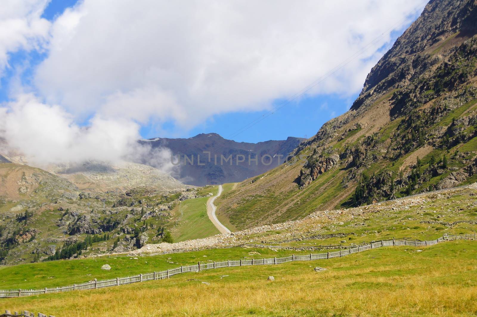 Mountain landscape in the Val Senales with steep roadway