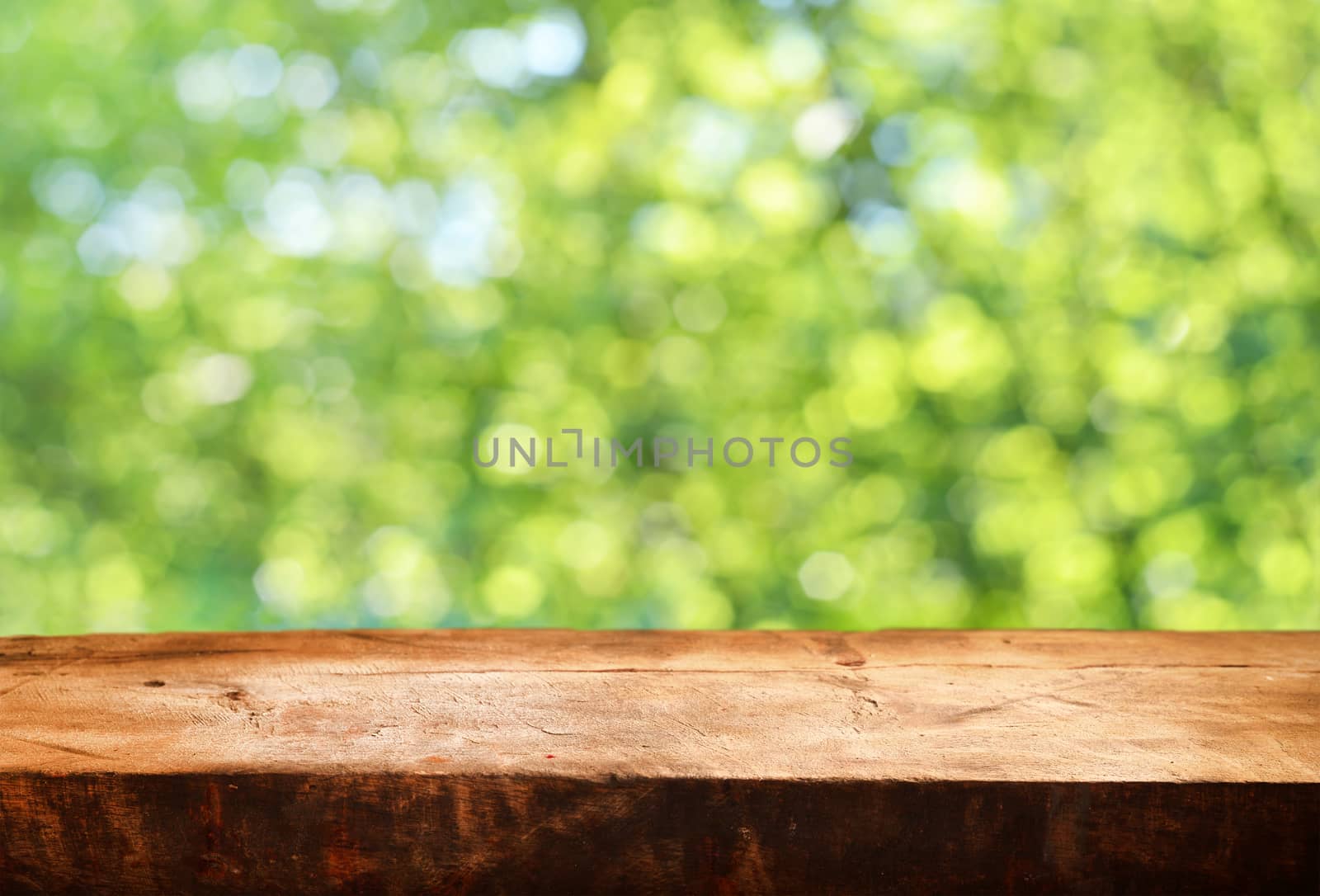 Empty wooden table and summer background