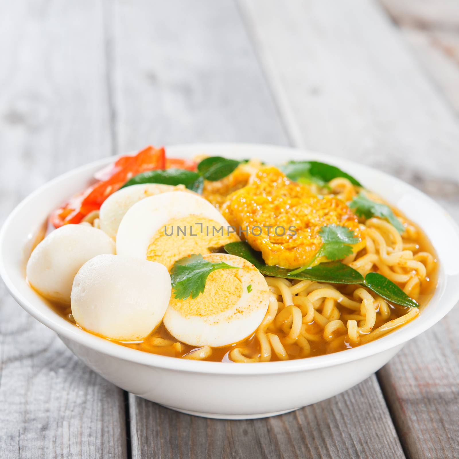 Instant noodles soup, in curry flavour. Hot and spicy.