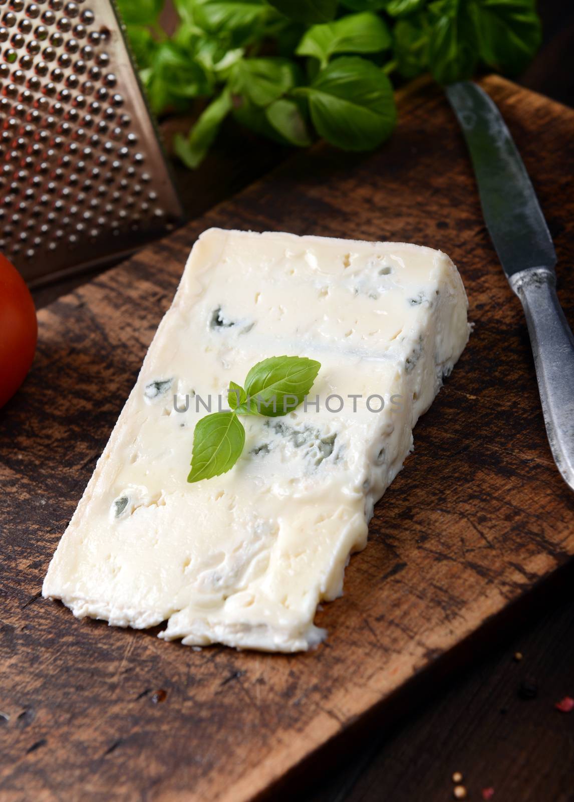 gorgonzola cheese on old wooden background