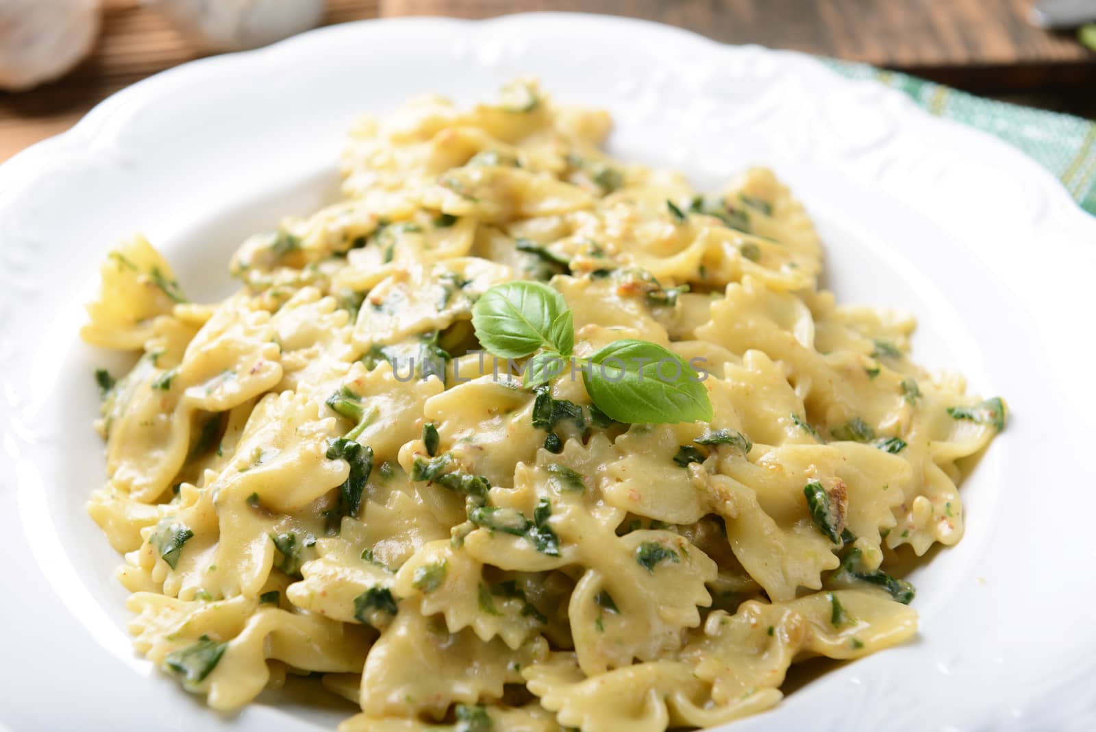 Farfalle pasta with fresh spinach and gorgonzola cheese