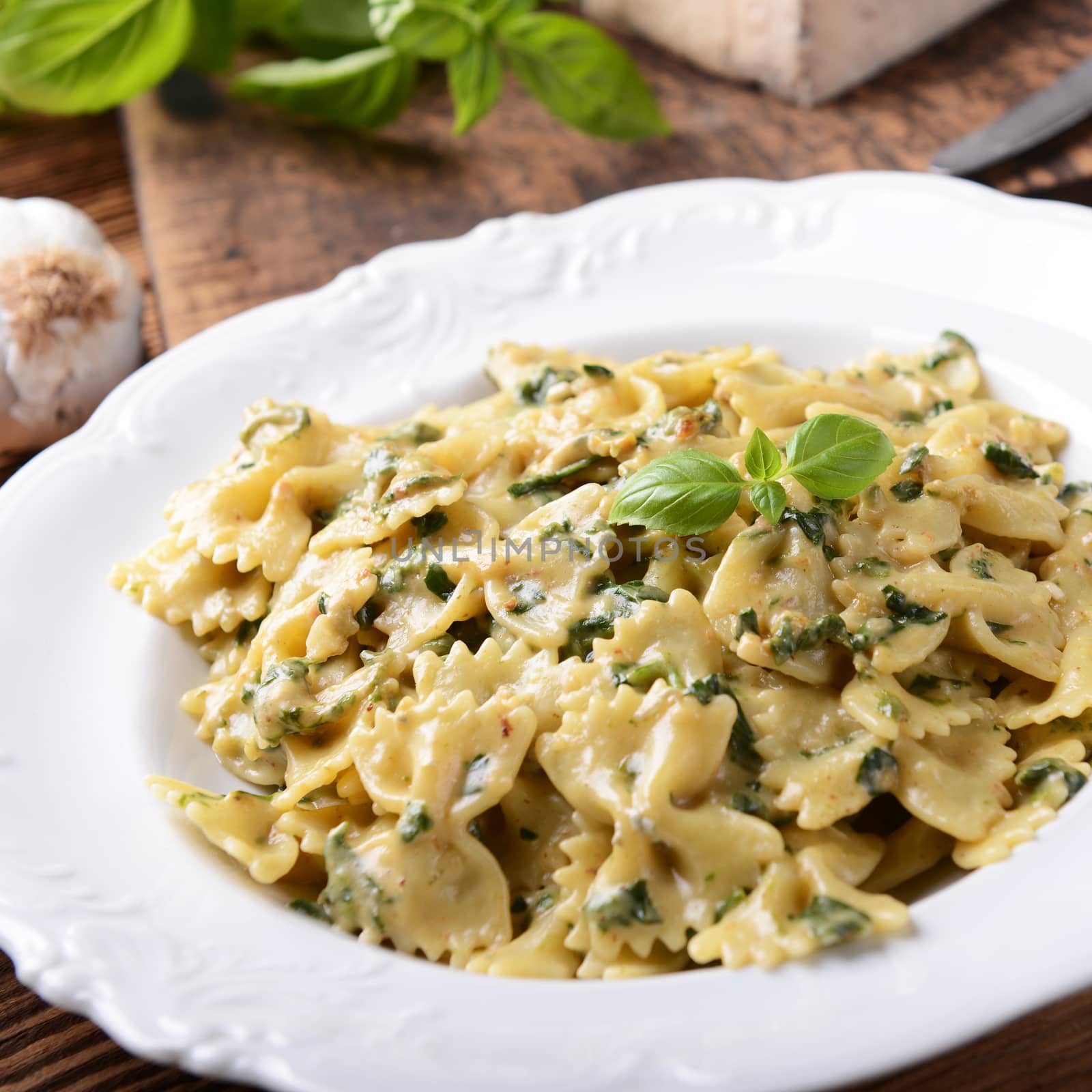 Farfalle pasta with fresh spinach and gorgonzola cheese
