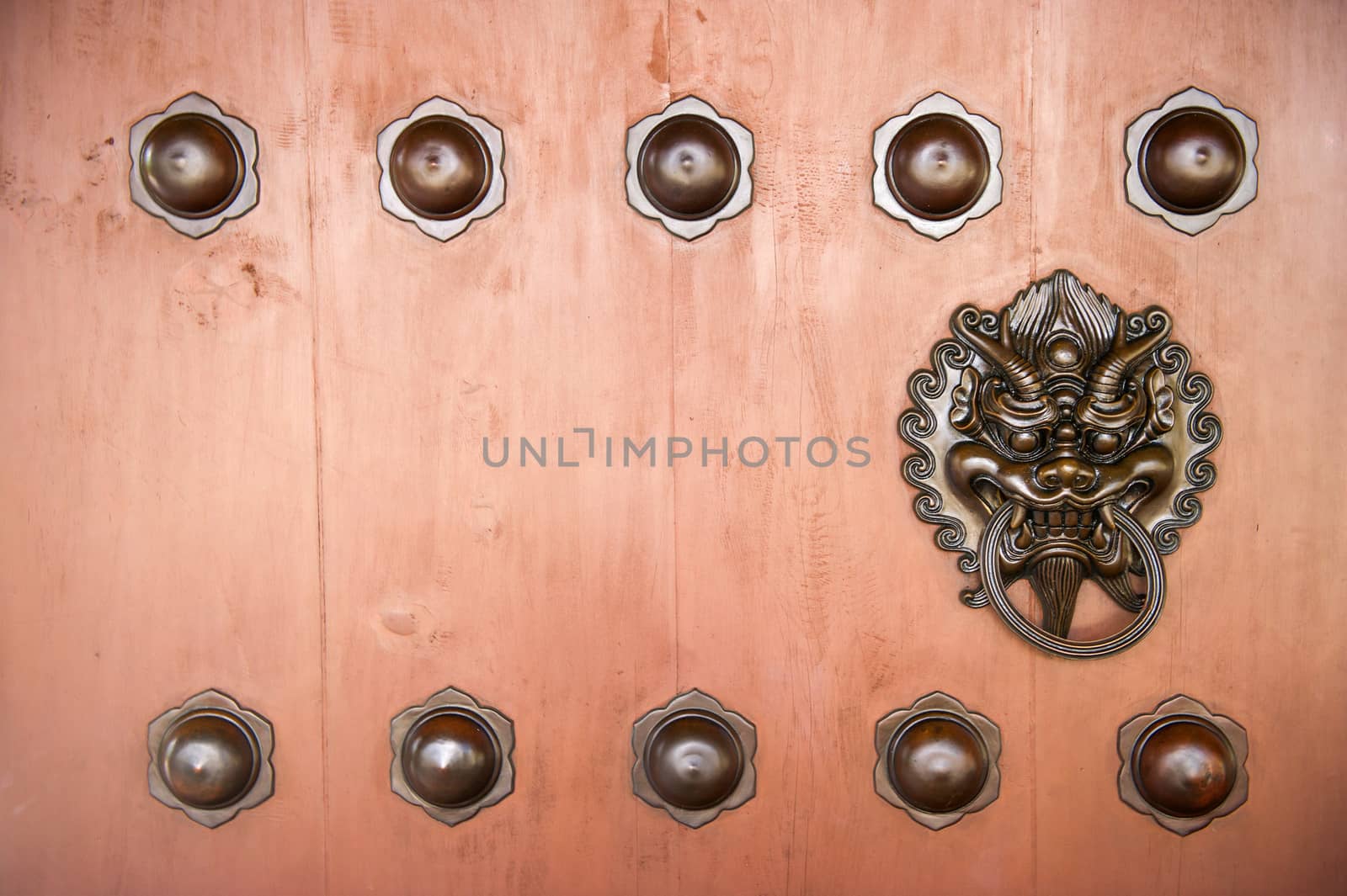 Hang Door Knocker Metal in Nunnery temple, Hong Kong. by think4photop