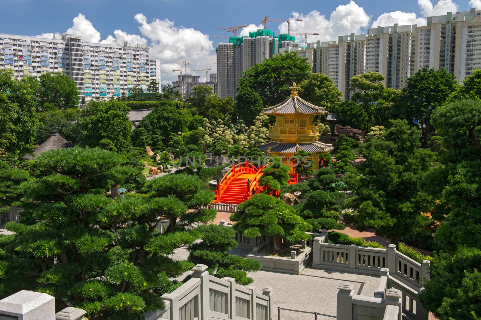 Arch Bridge and Pavilion in Nan Lian Garden, Hong Kong. by think4photop