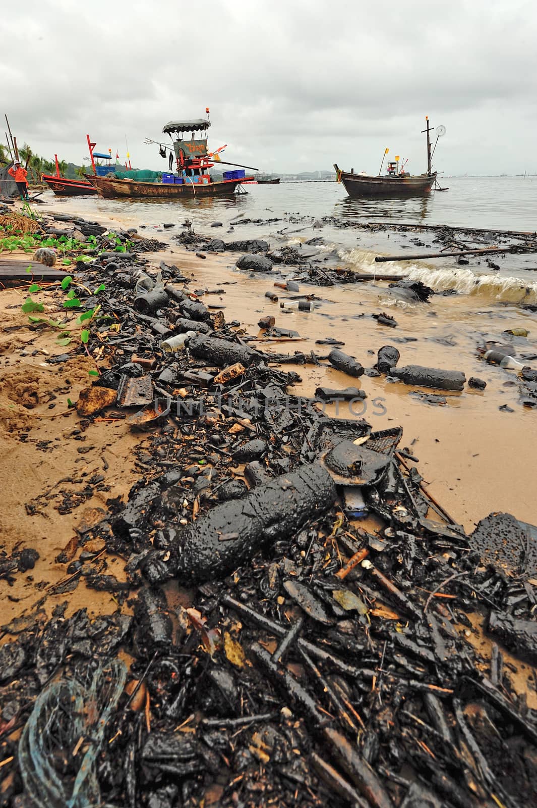 Oil spill. Contaminated Beach in Chonburi, Thailand.