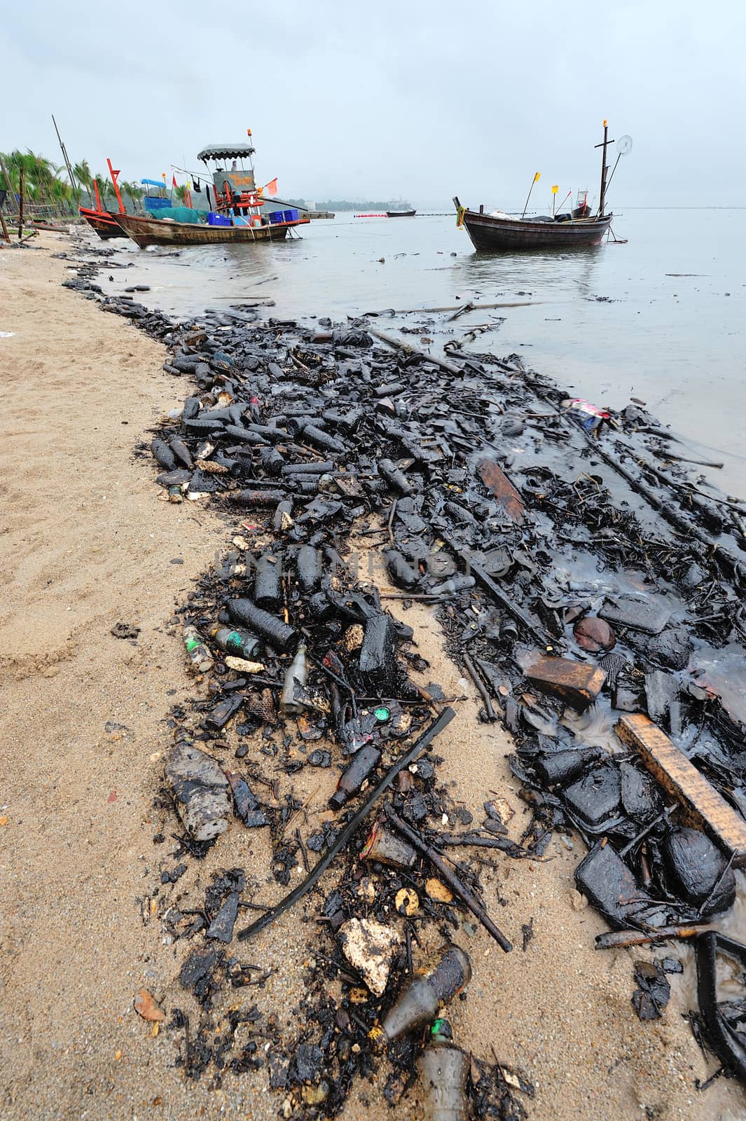 Oil spill. Contaminated Beach in Chonburi, Thailand.