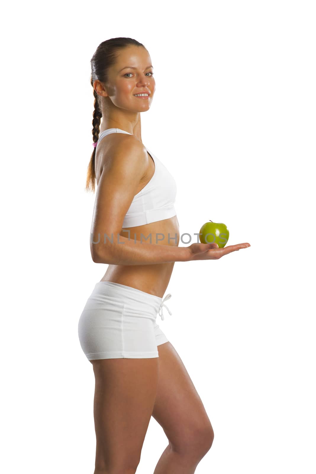 young attractive sporty woman with green apple by adam121