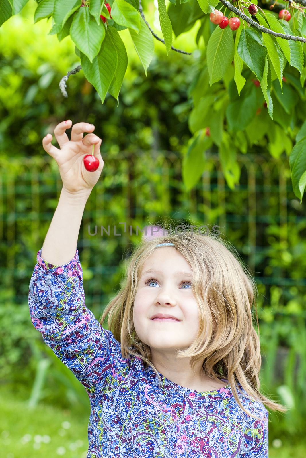 girl with cherry in the hand by vwalakte