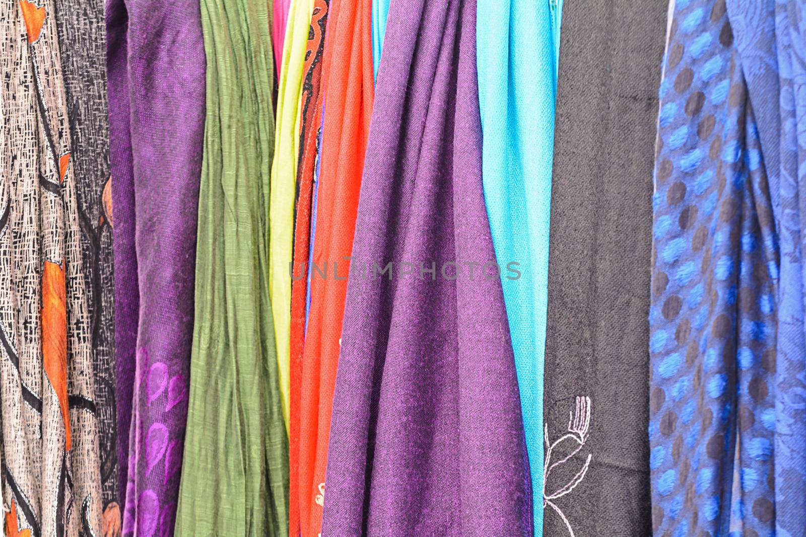 Colorful fabric textures hanging ,for a background.