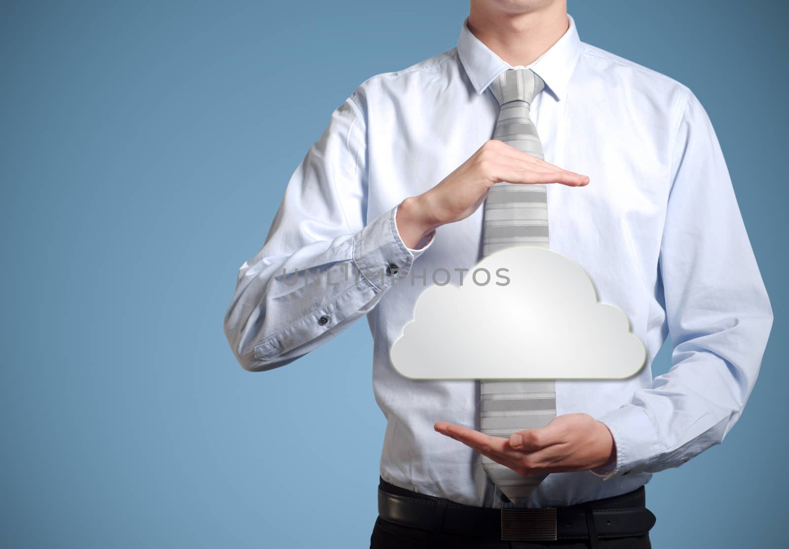 Businessman holding cloud computer network by alistaircotton