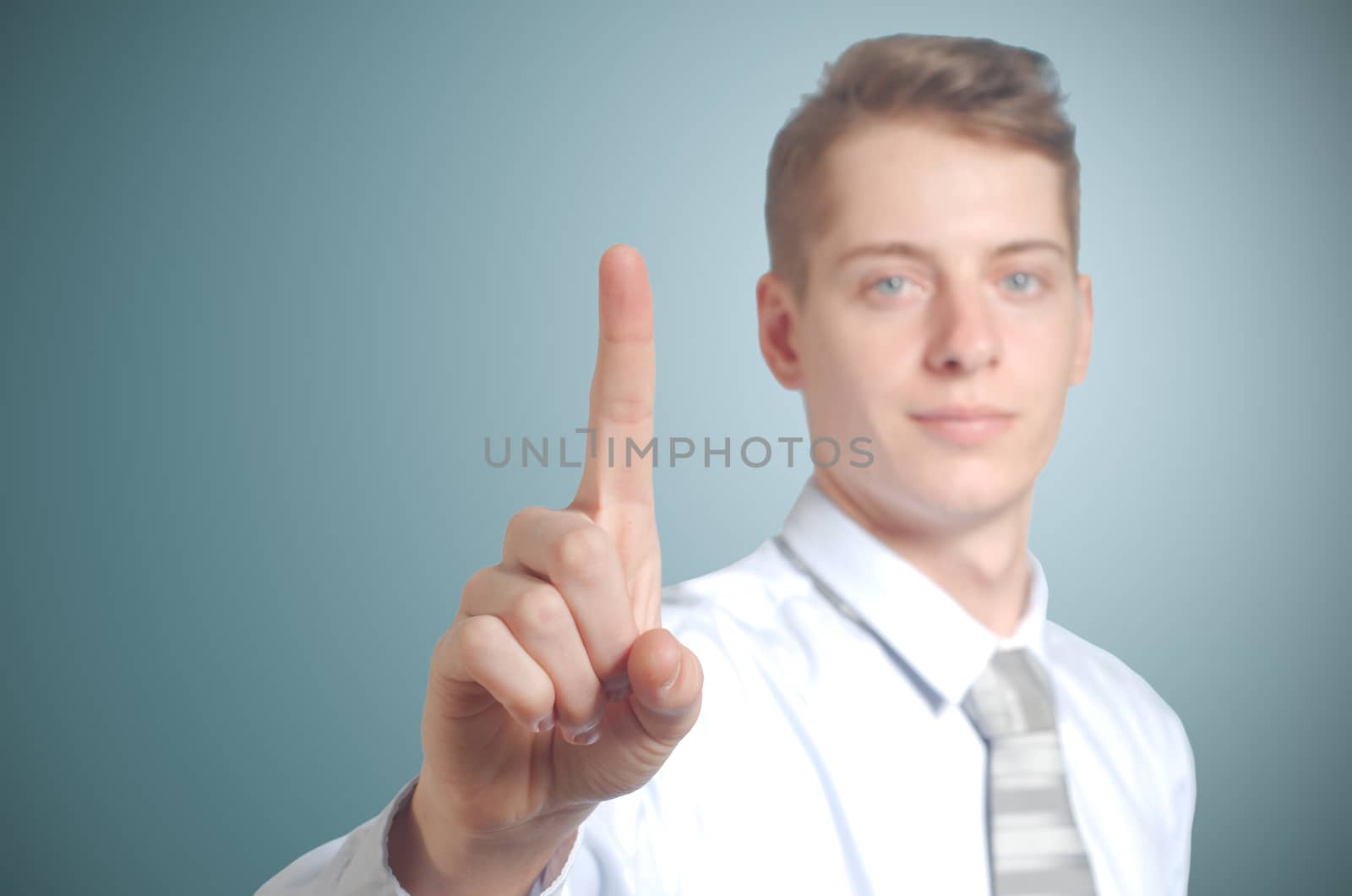 Businessman pushing imaginary button one finger - insert own concept