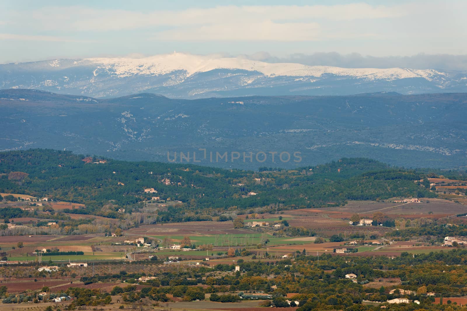 General landscape view from Luberon region with snow ridges of Alpes, Provence, France in winter season