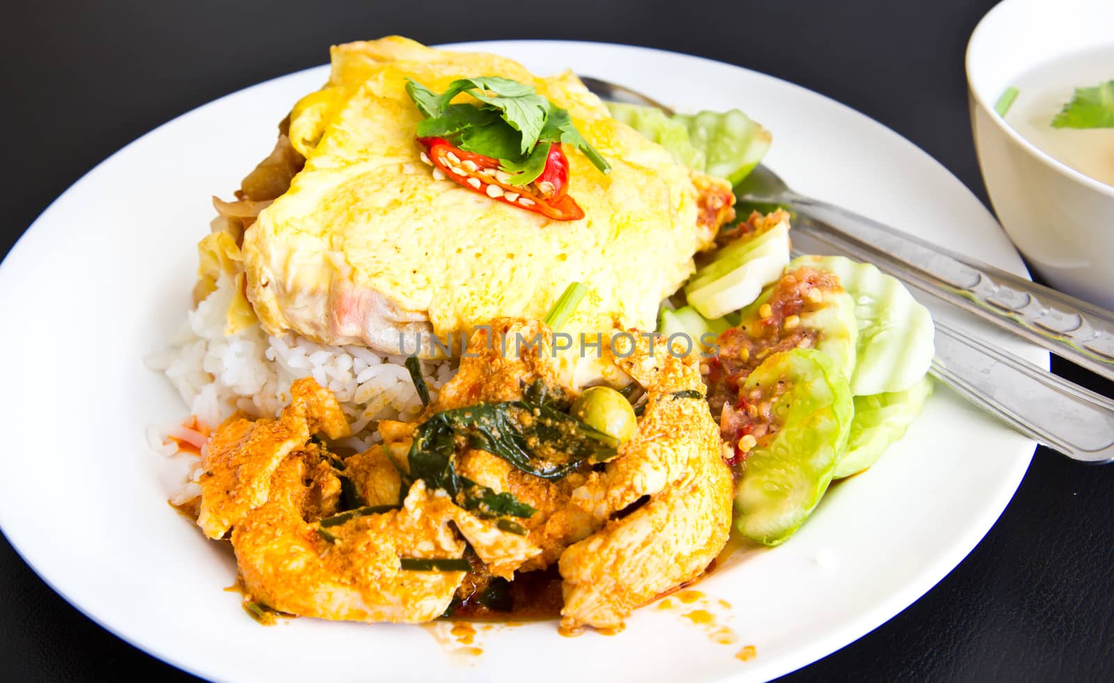 Spicy chicken curry and omelet  with jasmine rice
 by tisskananat