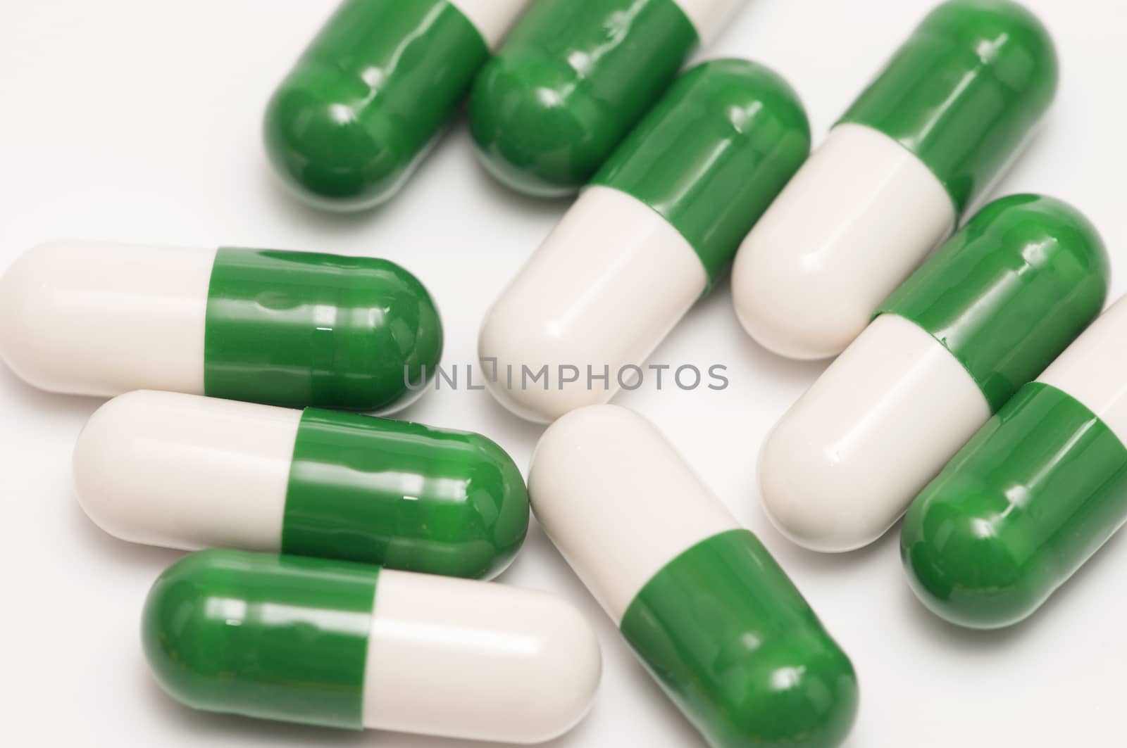 Some capsules and pills isolated on white background
