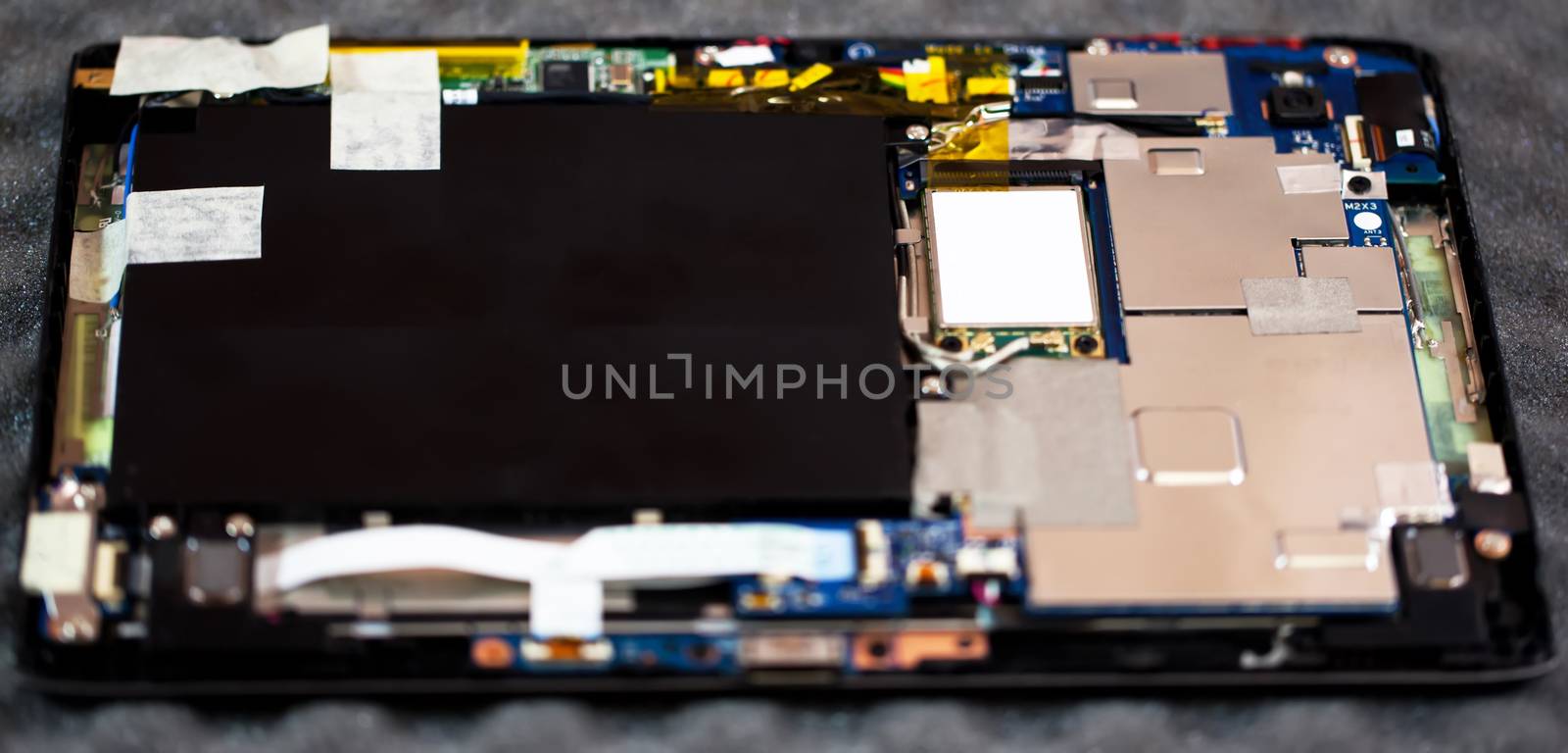 Tablet motherboard  closeup by RawGroup