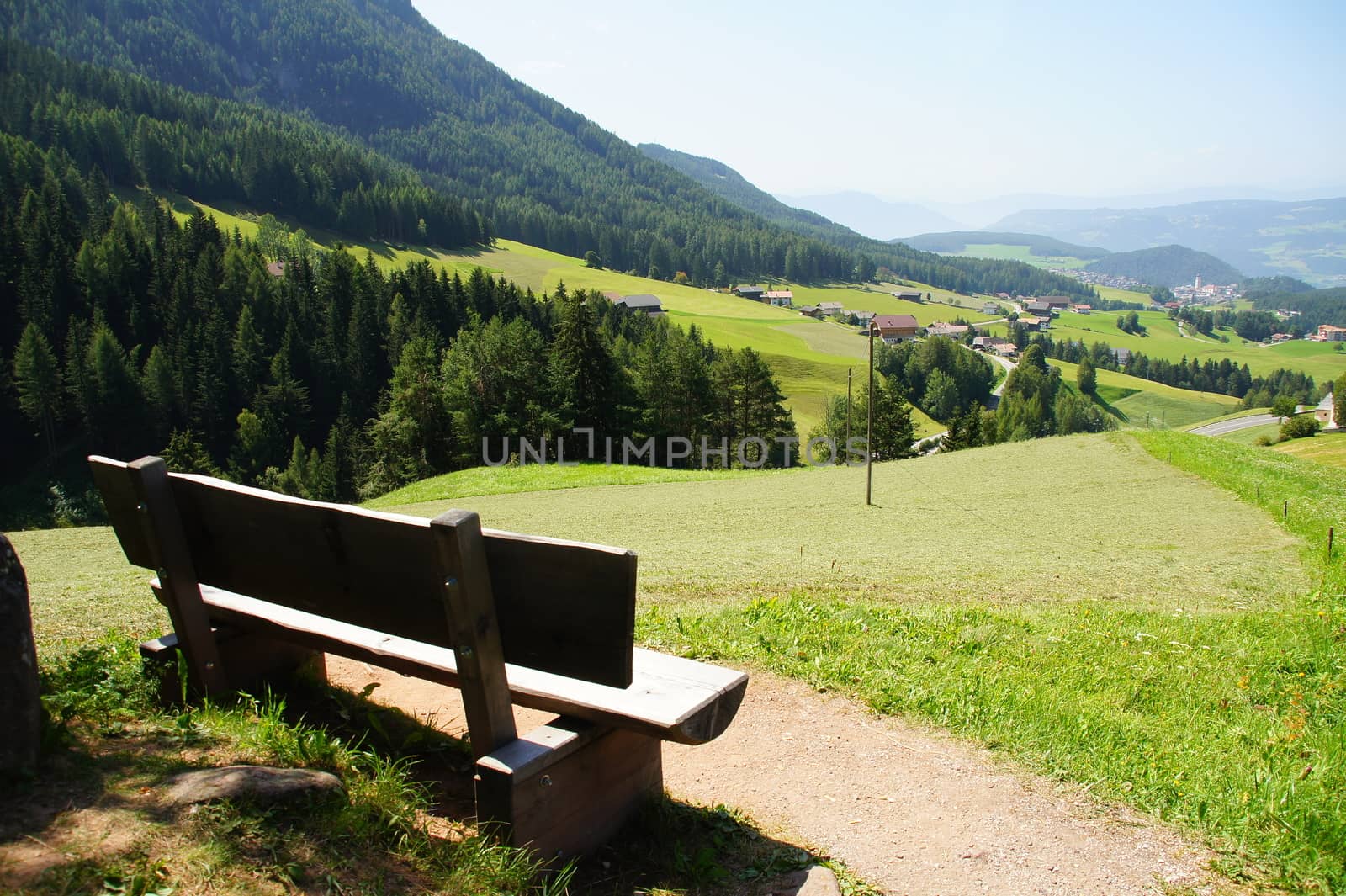 Wooden bench near Castelrotto in South Tyrol at the foot of the Alpe di Siusi