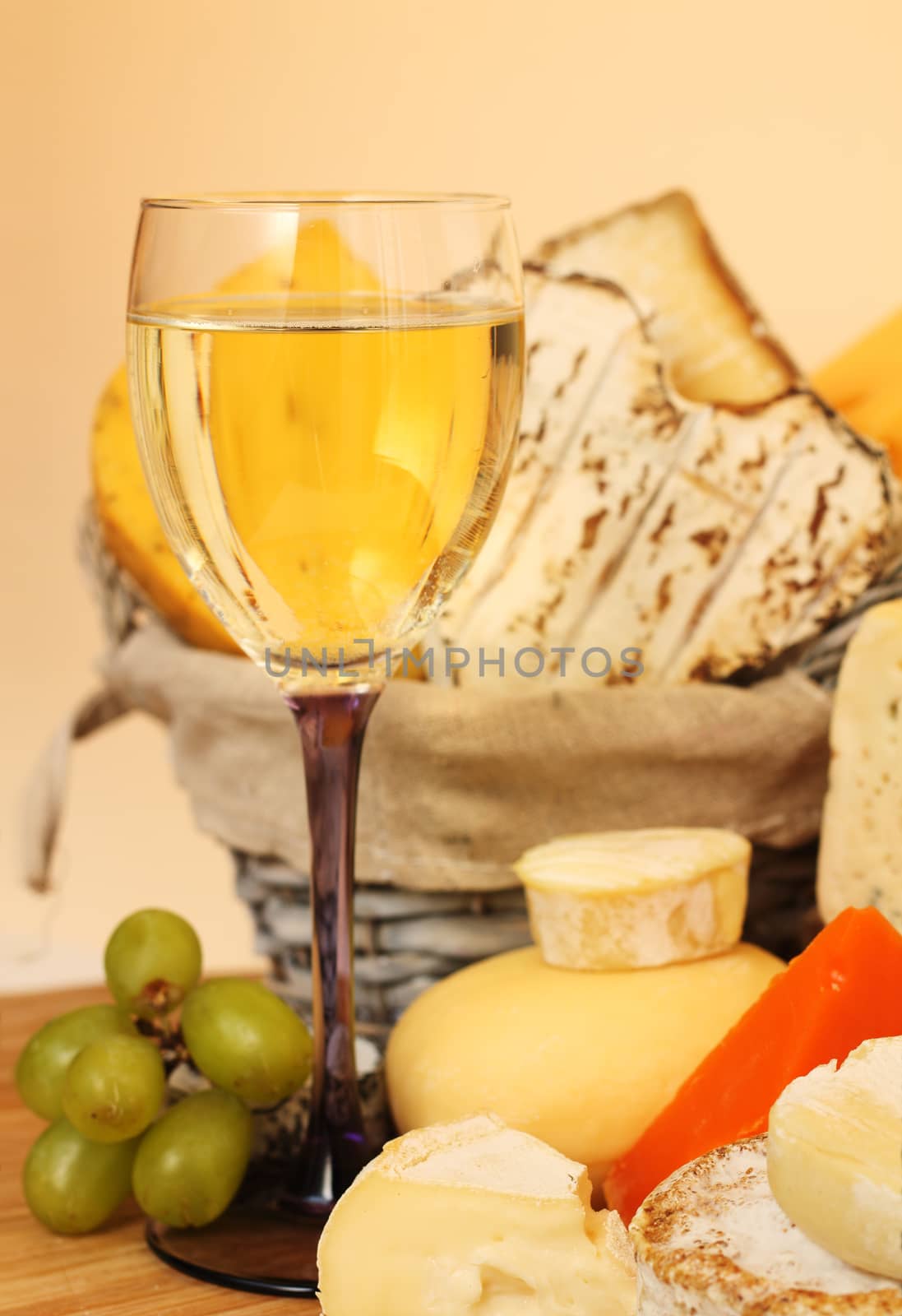 Various types of cheese and wine composition