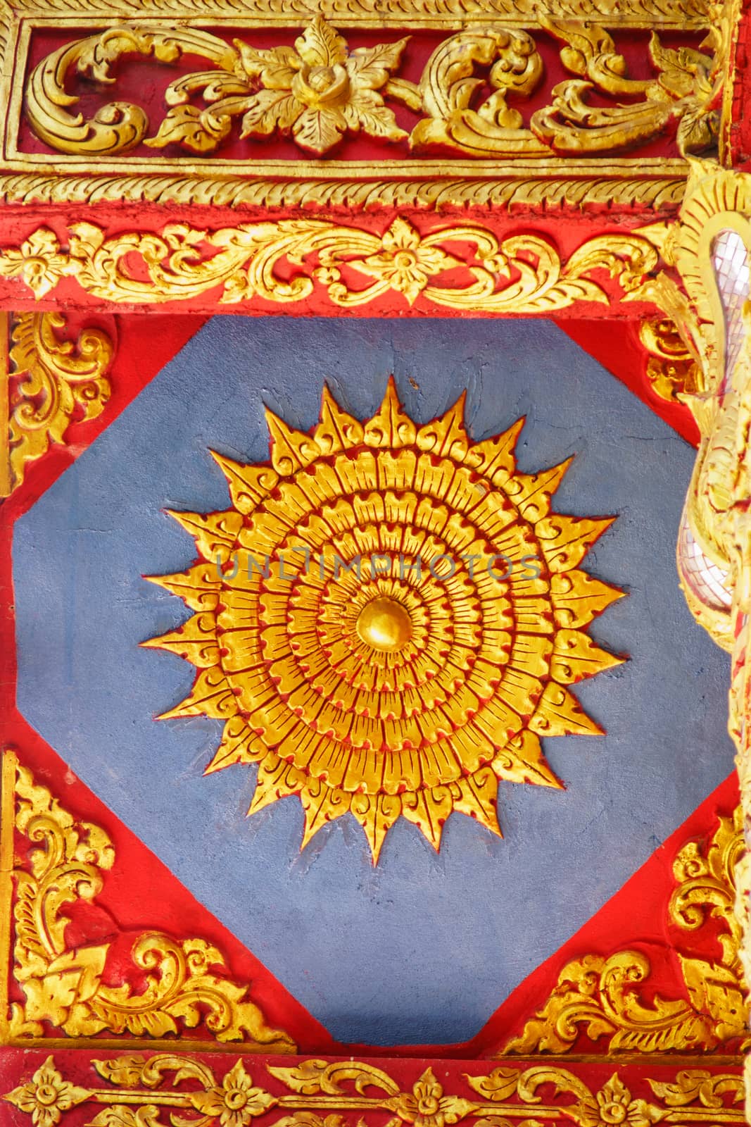 stucco work in thai art that usually decorated with mirror and precious stone or gold leaf,Chiang rai temple,Thailand