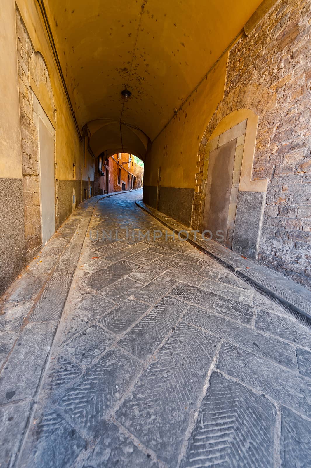 Narrow Passage with Old Buildings in Italian City