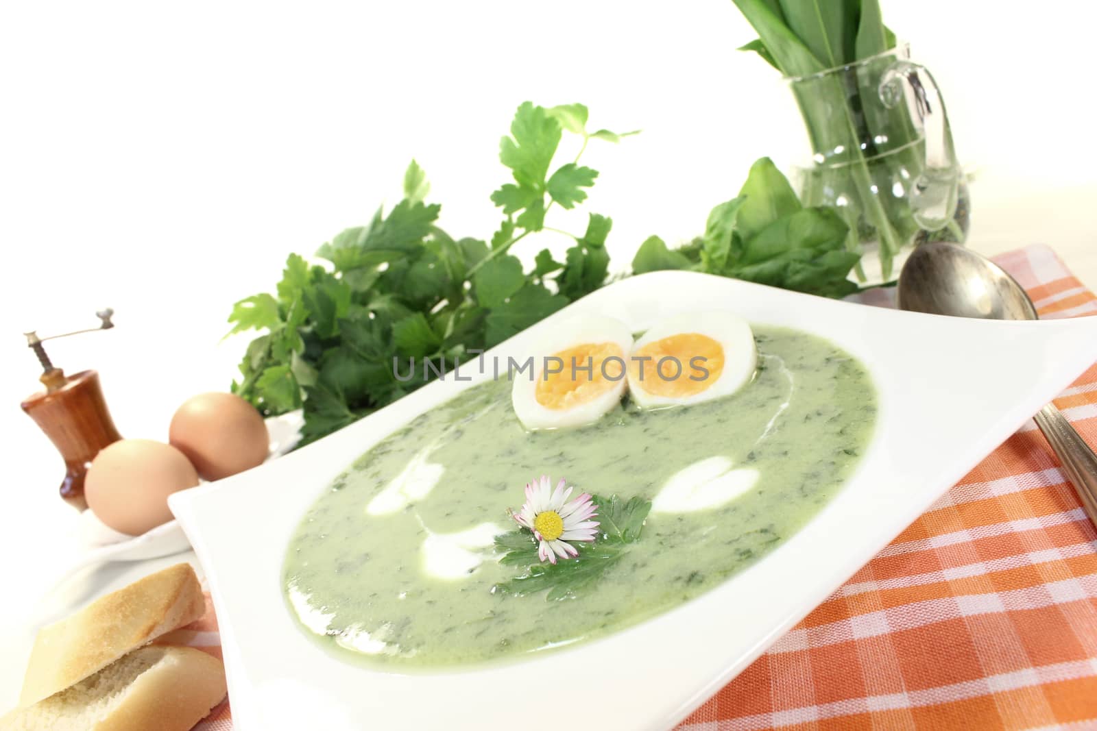 fresh herbs soup with eggs by discovery