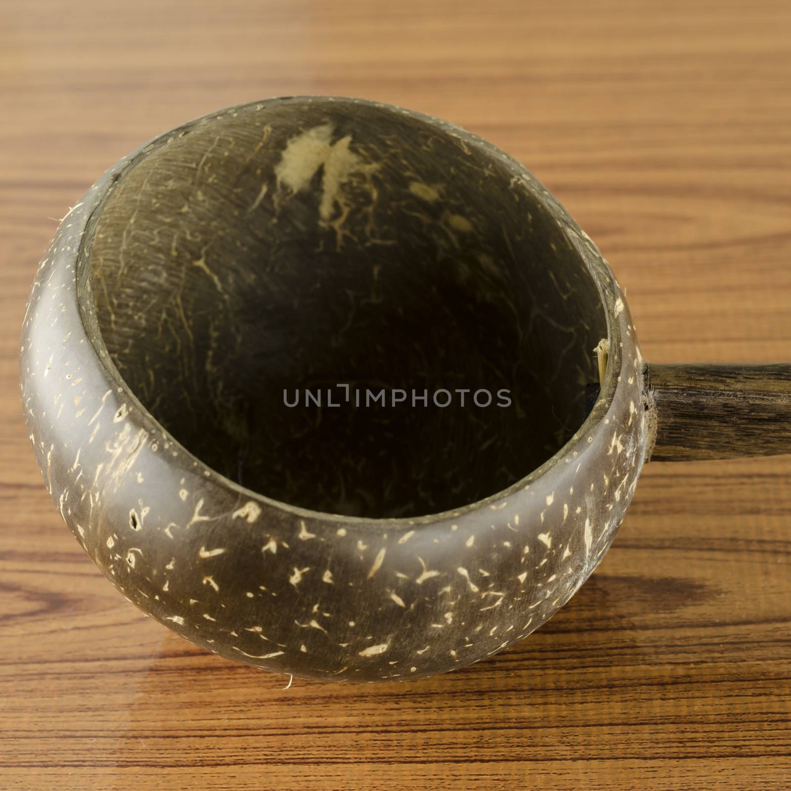 thai wood bowl container for drinking water on wood background