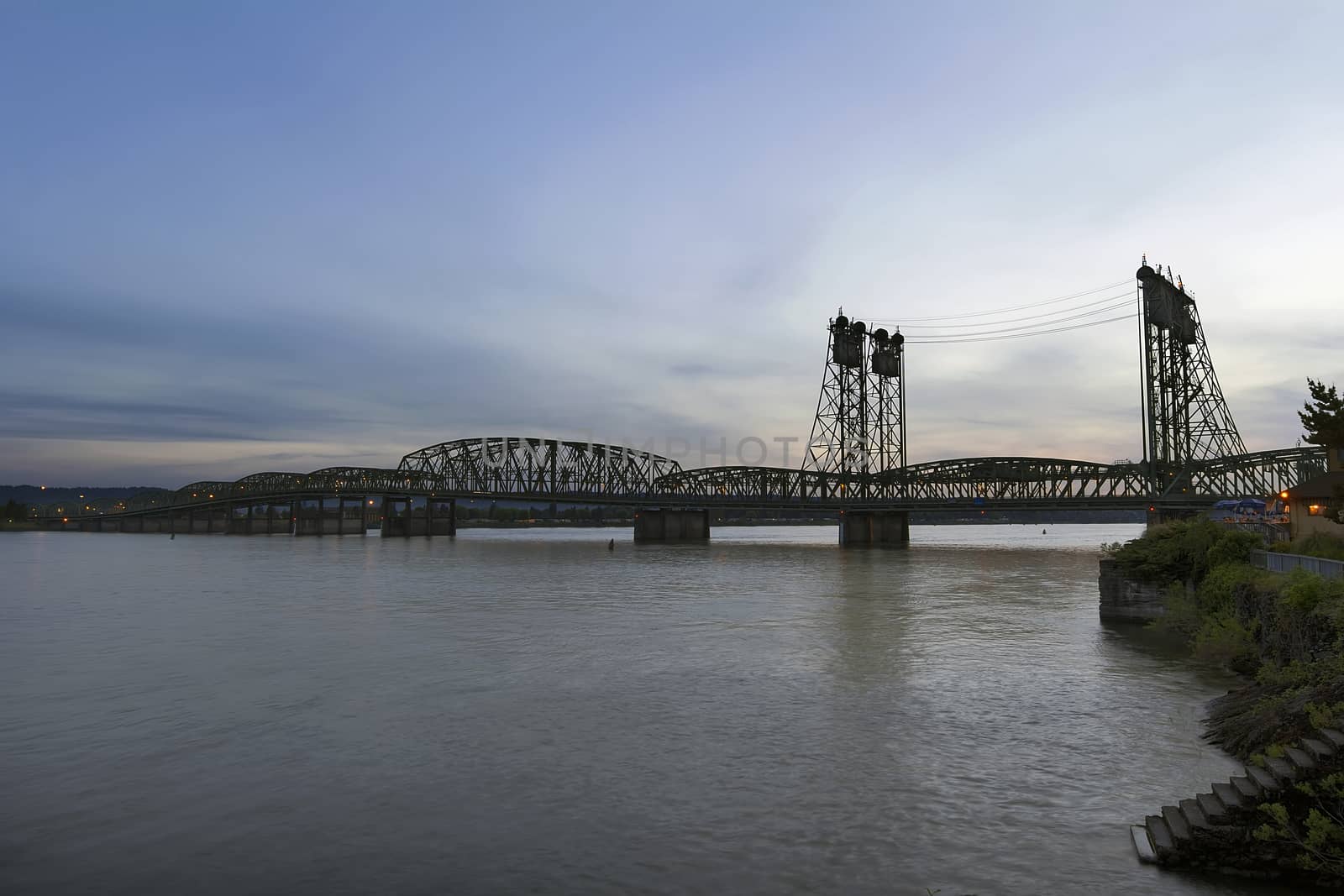 Interstate Bridge I-5 Over Columbia River Waterfront After Sunset at Dusk Between Oregon and Washington States
