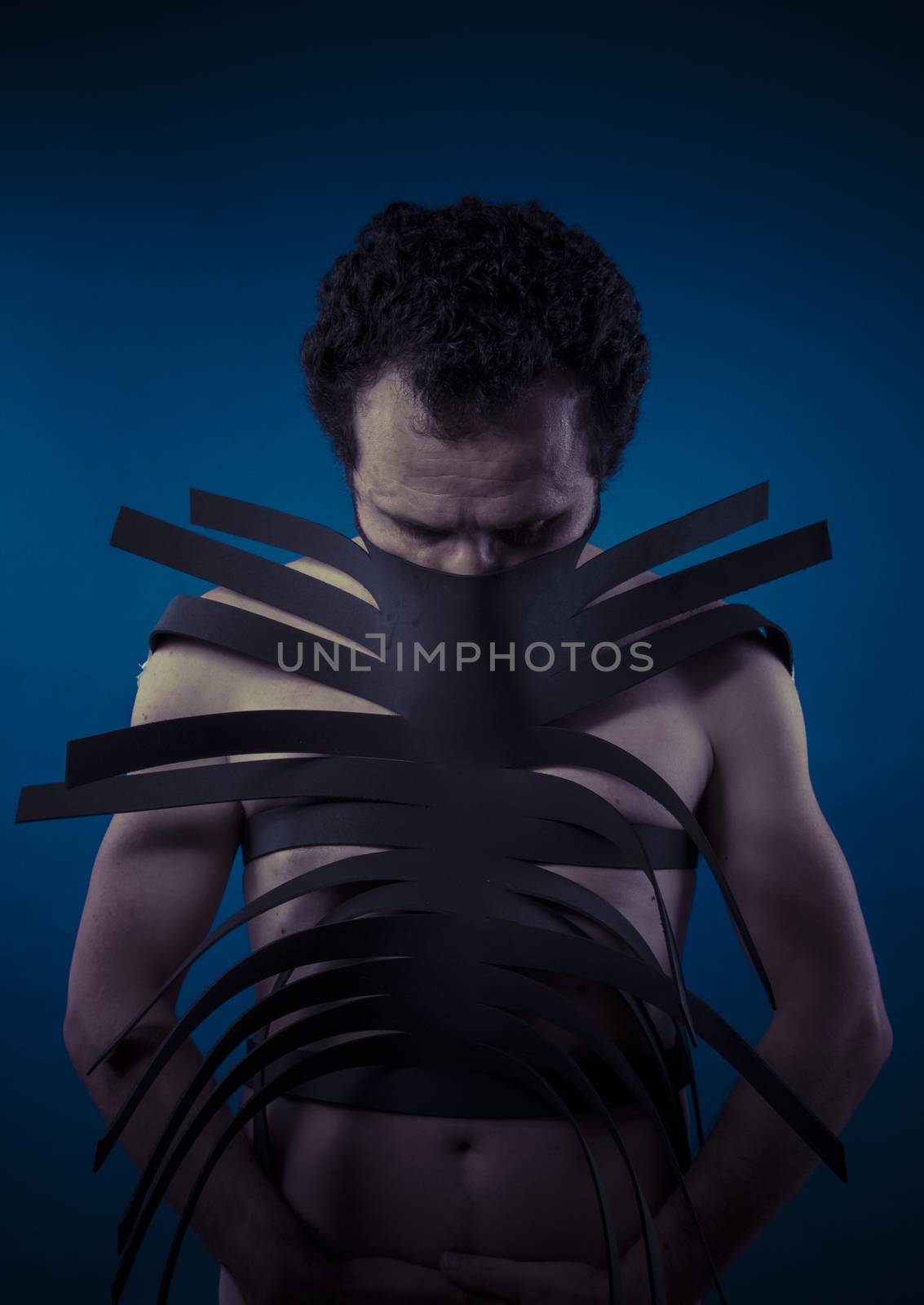 Bdsm, man covered with black strips, shibari concept art