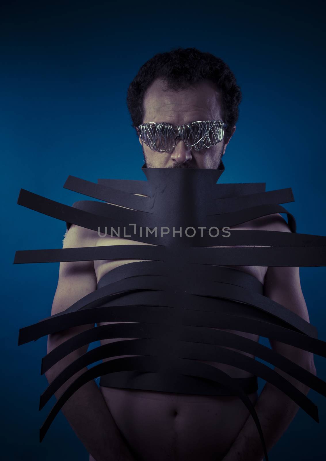 Bdsm, man covered with black strips, shibari concept art