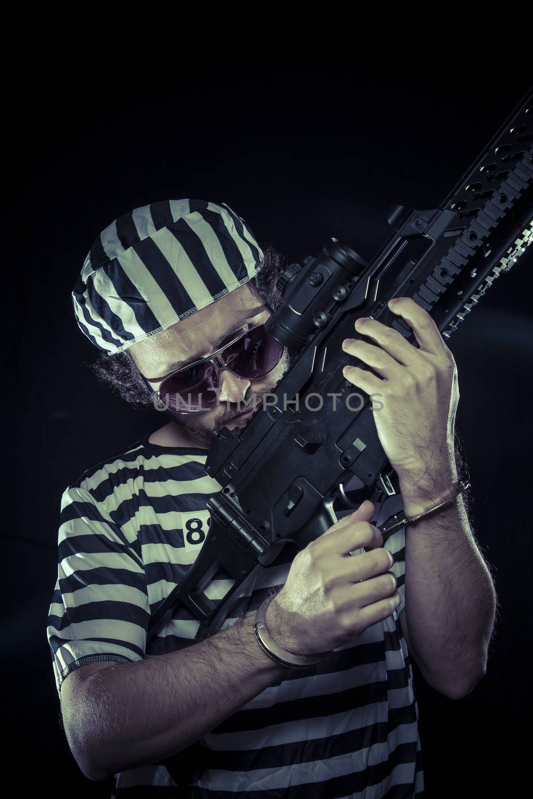 riot, prisoner in a prison with a machine gun by FernandoCortes