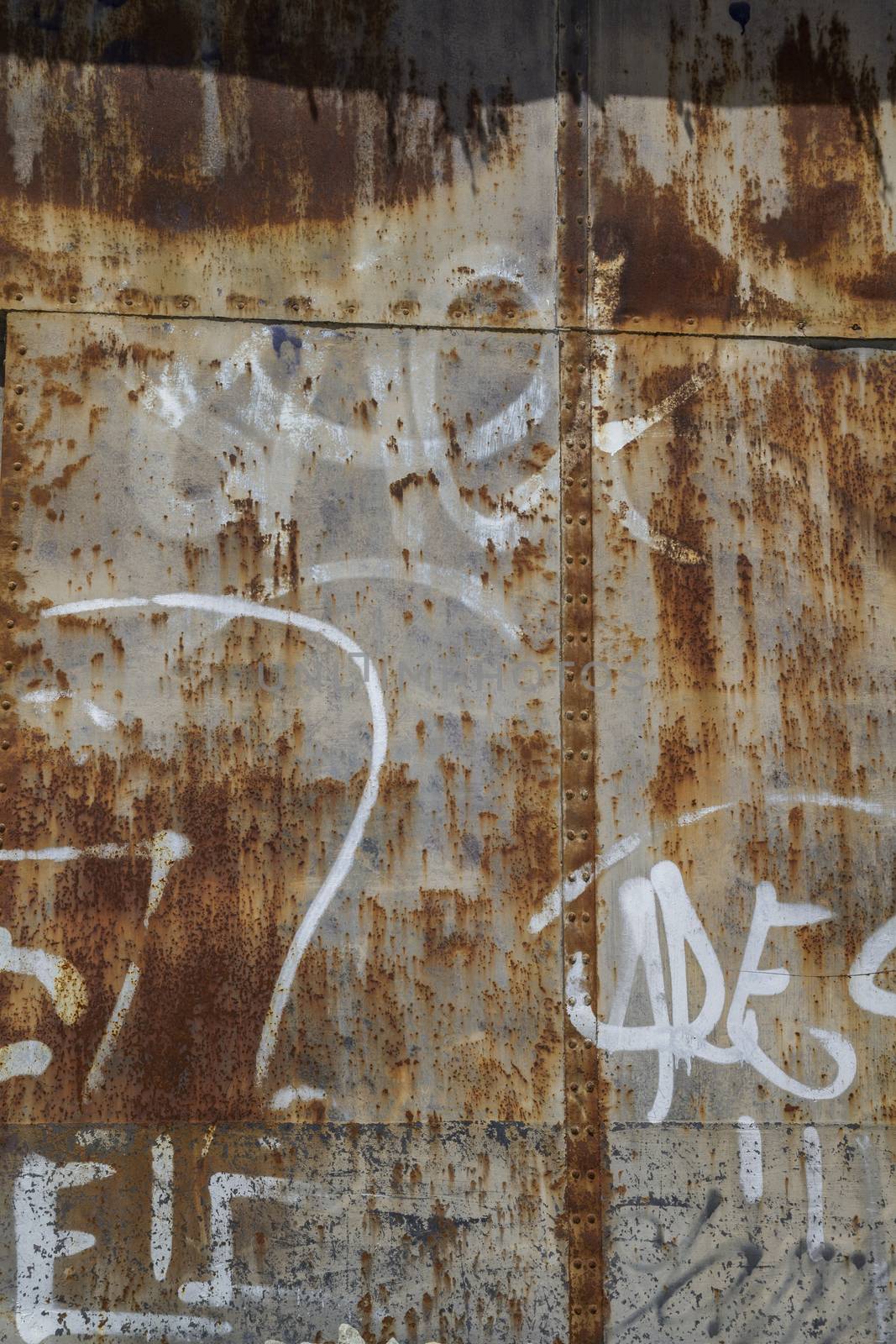 Grafitti, old abandoned train station, rusty iron walls by FernandoCortes