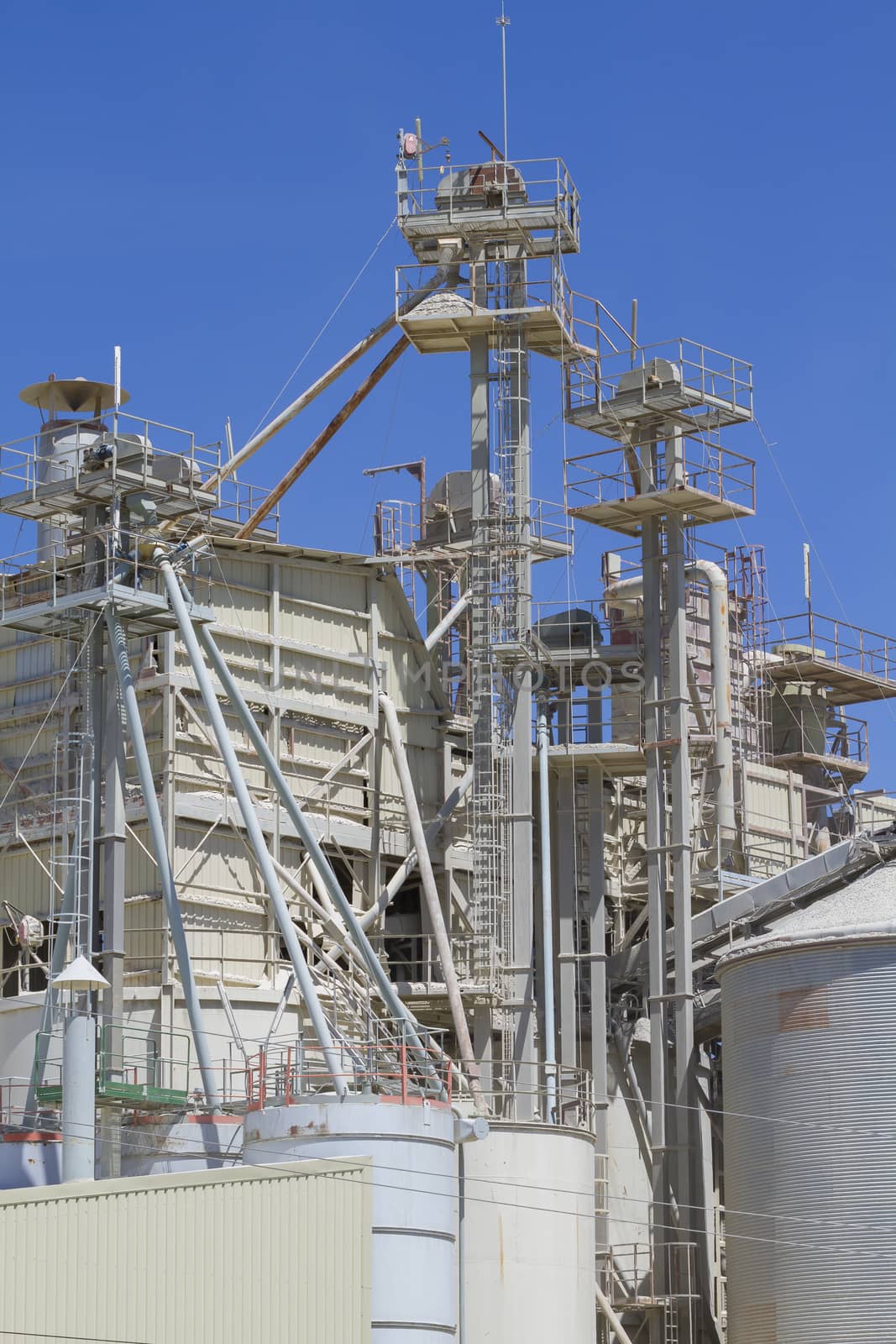 modern industry and refinery, details of pipes and smokestacks by FernandoCortes