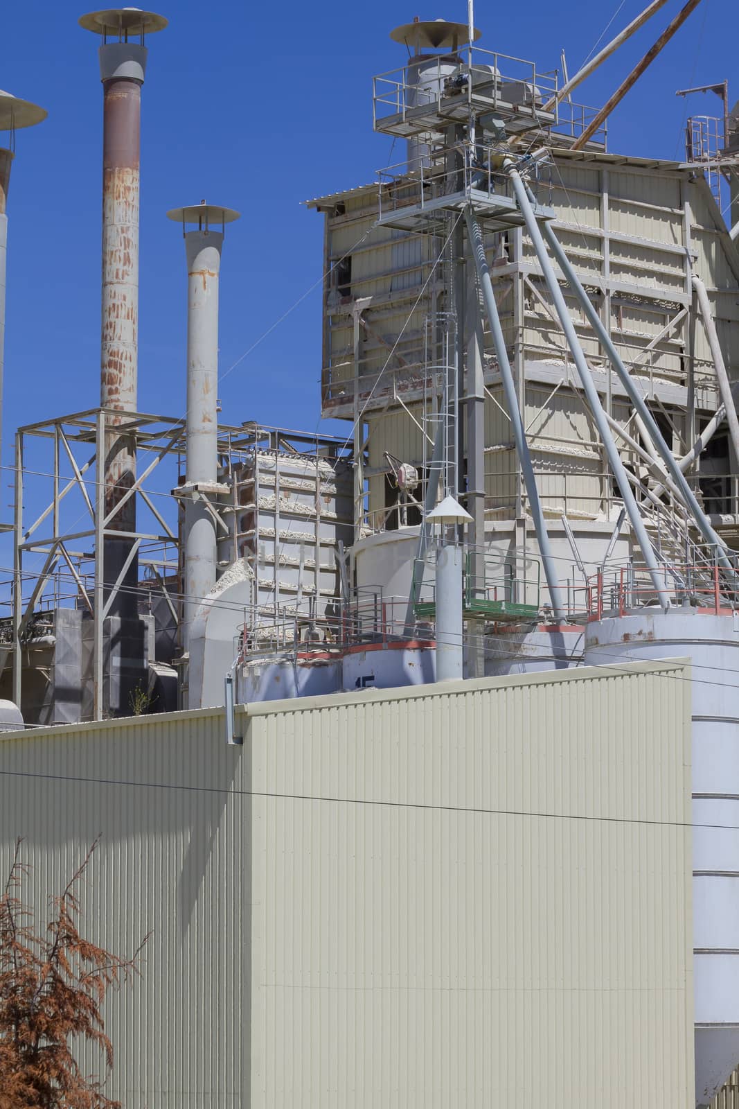 modern industry and refinery, details of pipes and smokestacks by FernandoCortes