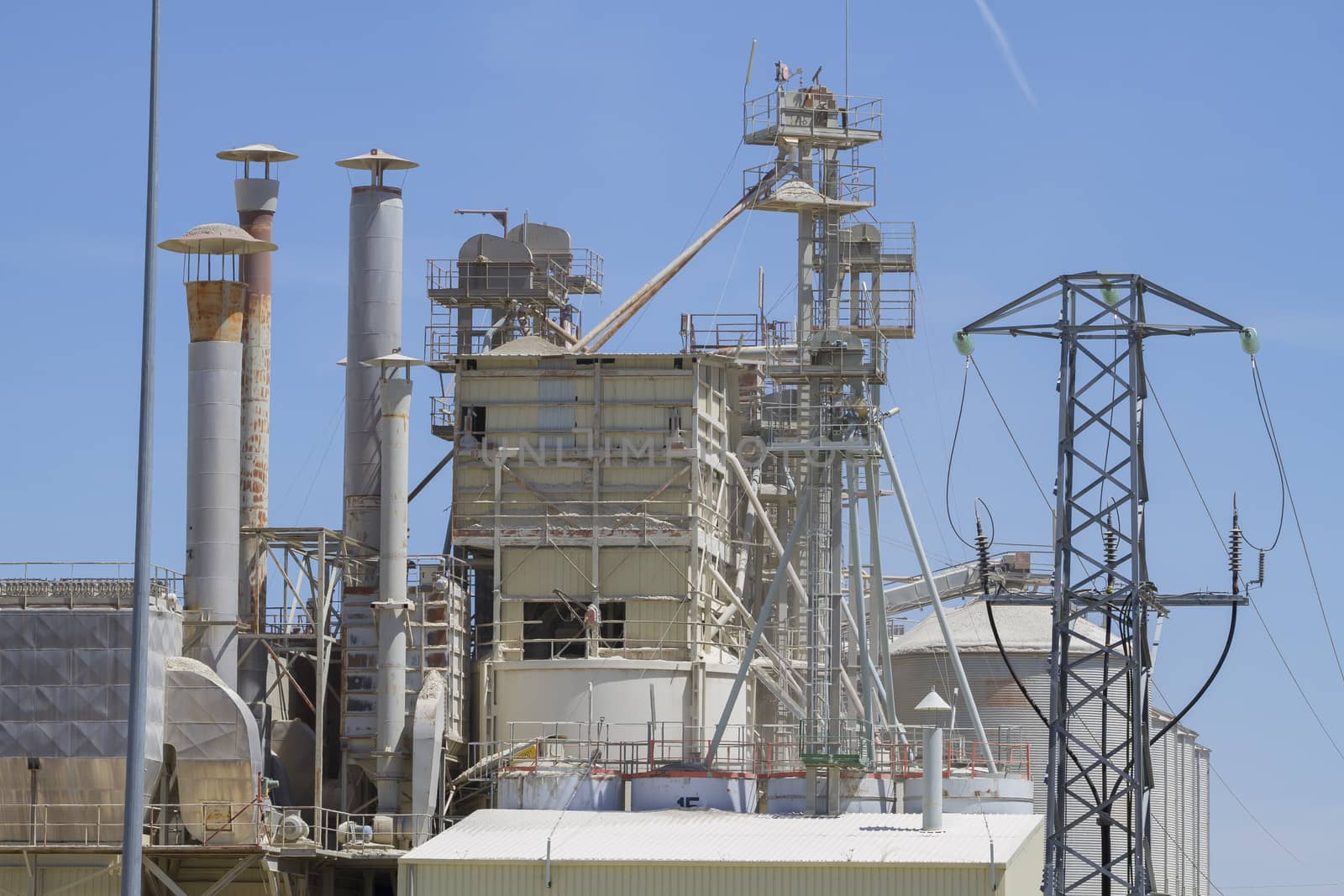 modern industry and refinery, details of pipes and smokestacks by FernandoCortes