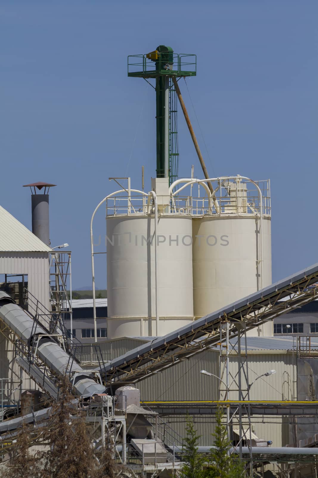 modern industry and refinery, details of pipes and smokestacks by FernandoCortes