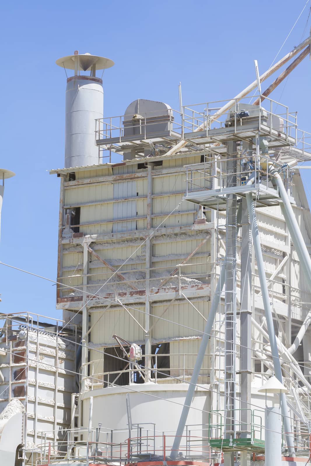 modern industry and refinery, details of pipes and smokestacks by FernandoCortes