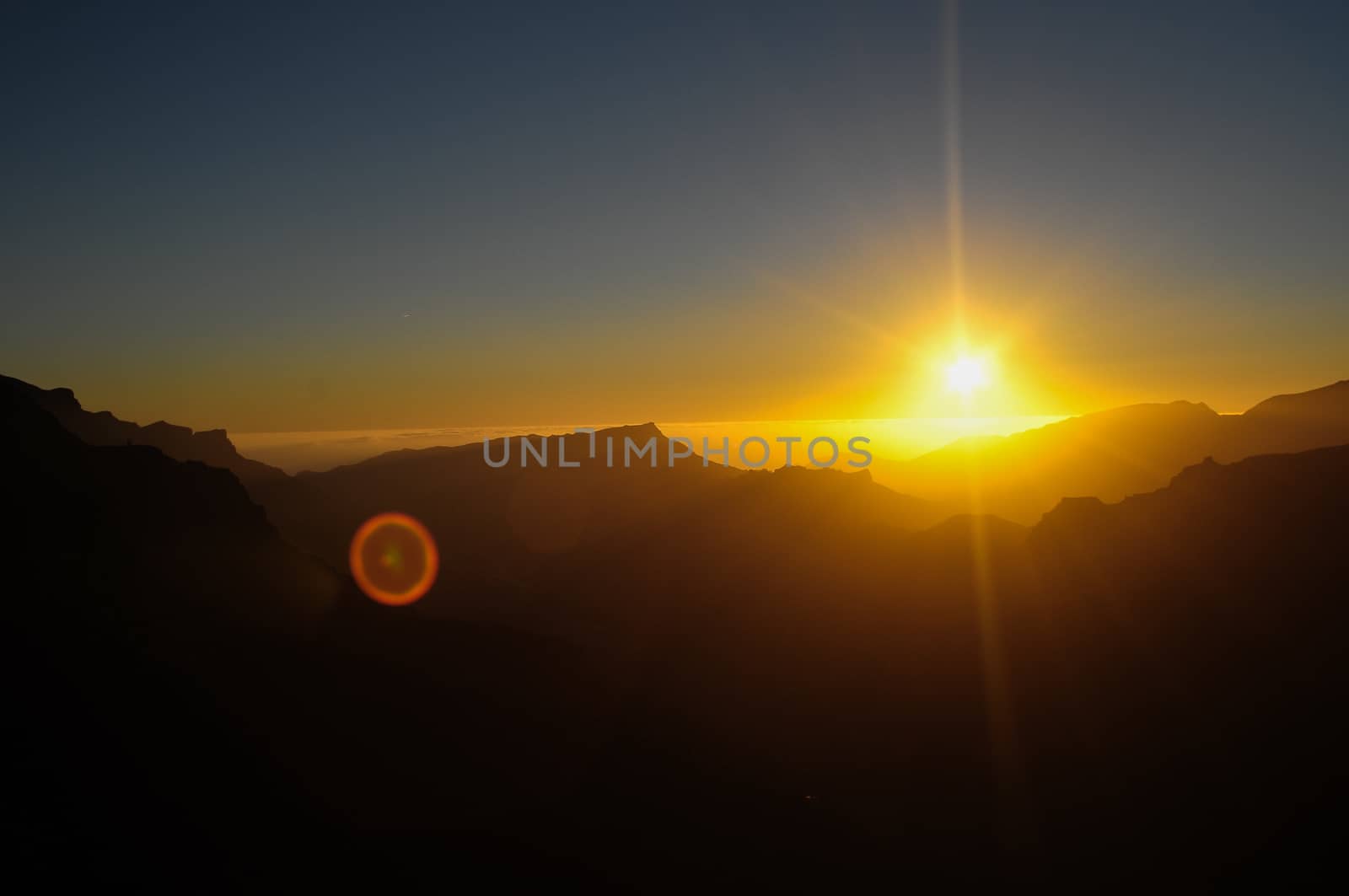 Backlight Silhouette Sunset over the Mountains in Canary Islands Tenerife